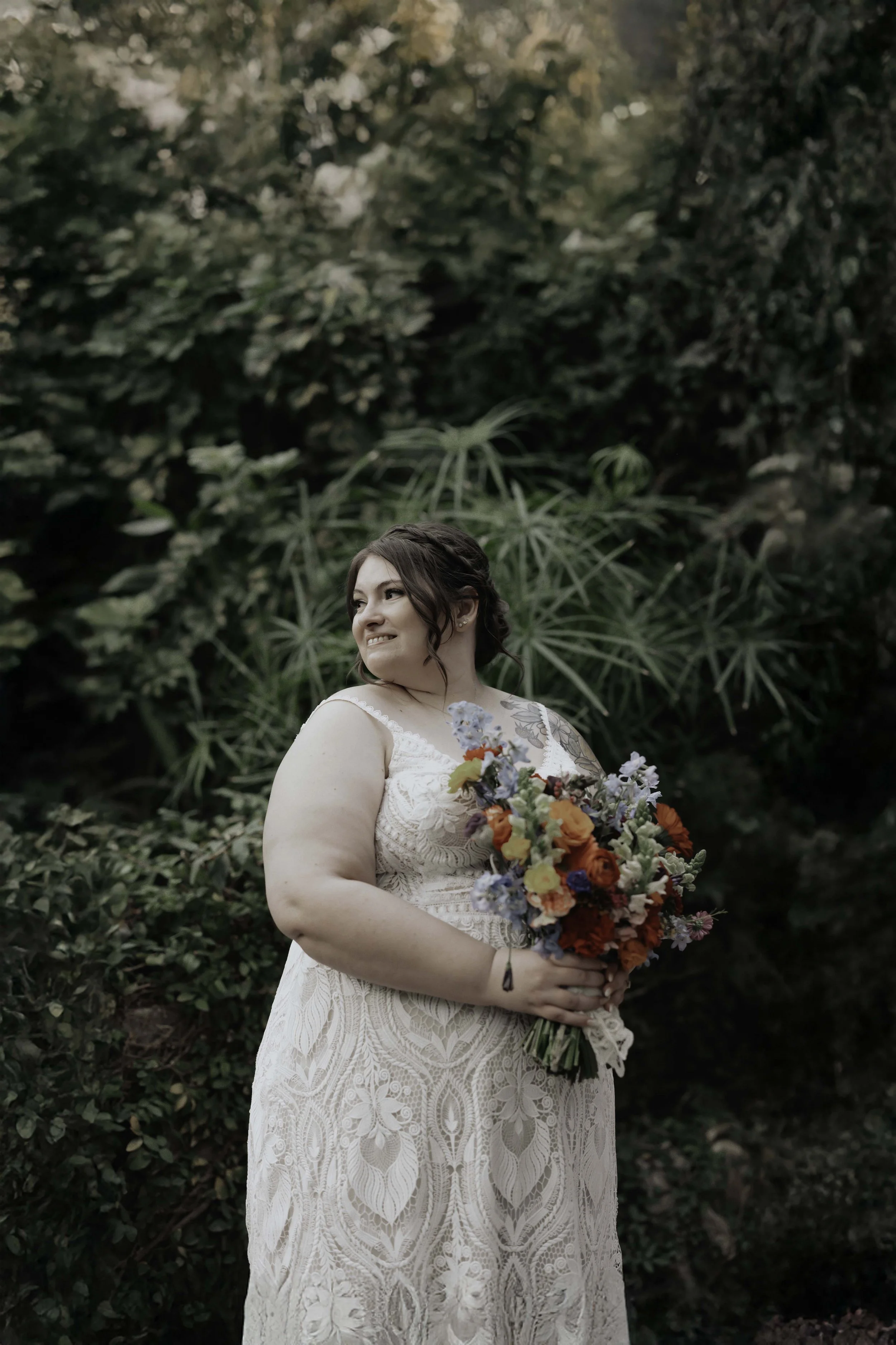 After the ceremony, Lauren and Joel explored the beautiful garden paths and adobe architecture of the Boojum Tree for their wedding portraits. Surrounded by desert greenery and warm Phoenix light, these moments captured the joy and excitement of thei