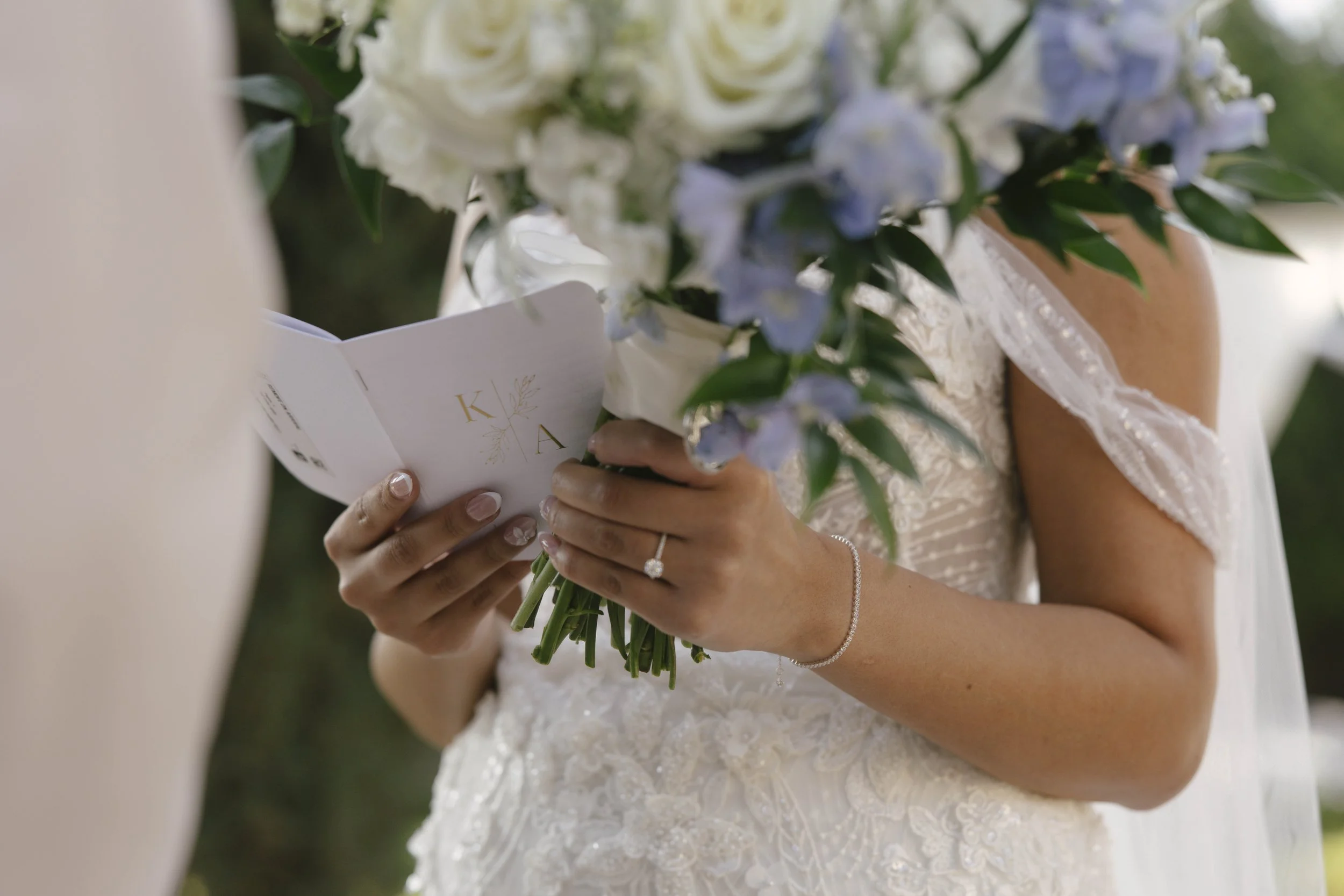The bride and groom’s first look at Ashley Castle in Chandler, Arizona, unfolded in the venue’s romantic garden gazebo, where hybrid film and digital photography captured their emotional private reveal with timeless elegance, natural light, and intim