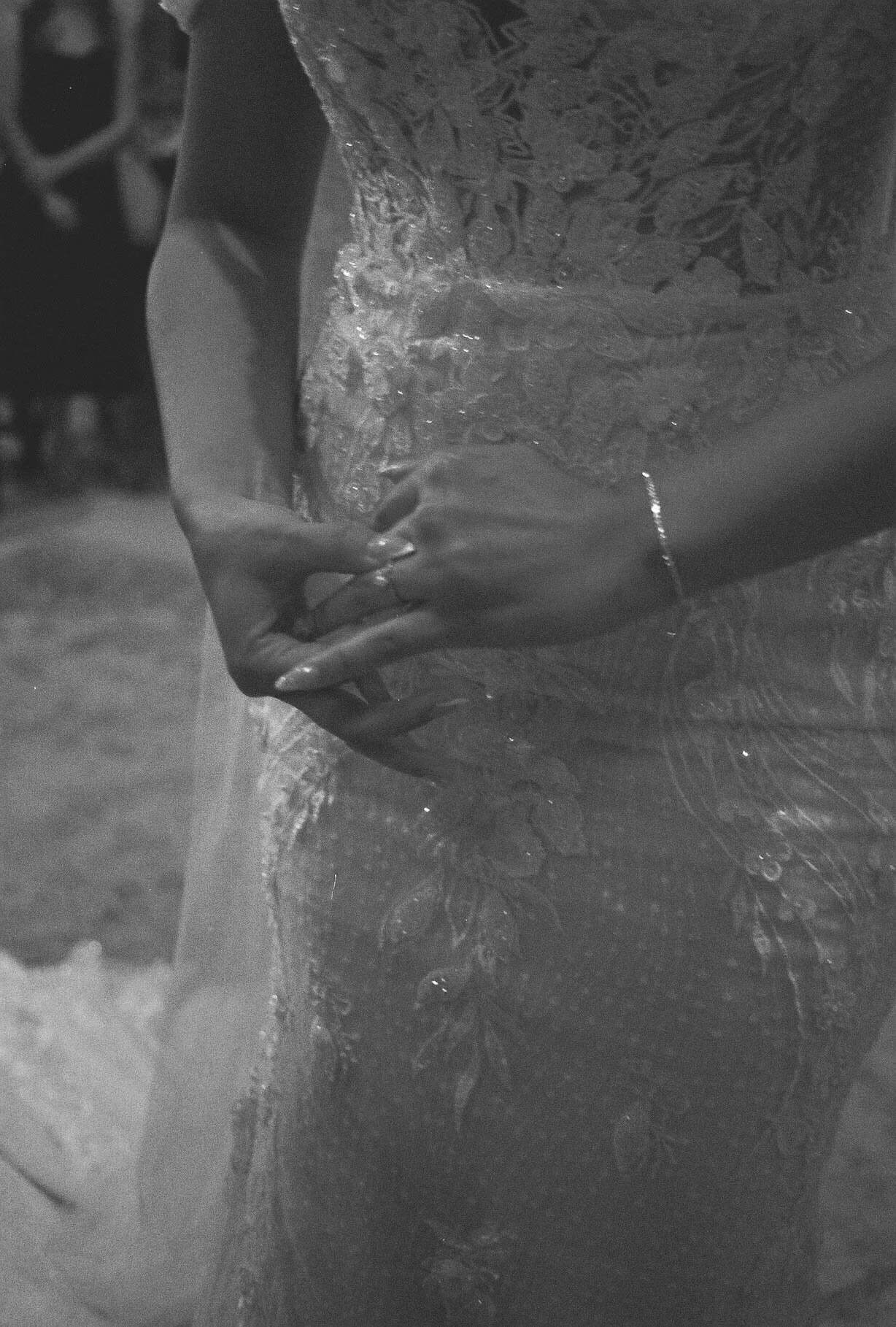 The bride’s final getting-ready moments at Ashley Castle in Chandler, Arizona, were captured through hybrid film and digital photography, preserving the intimate details of dress fastening, veil placement, and bridal finishing touches with timeless e