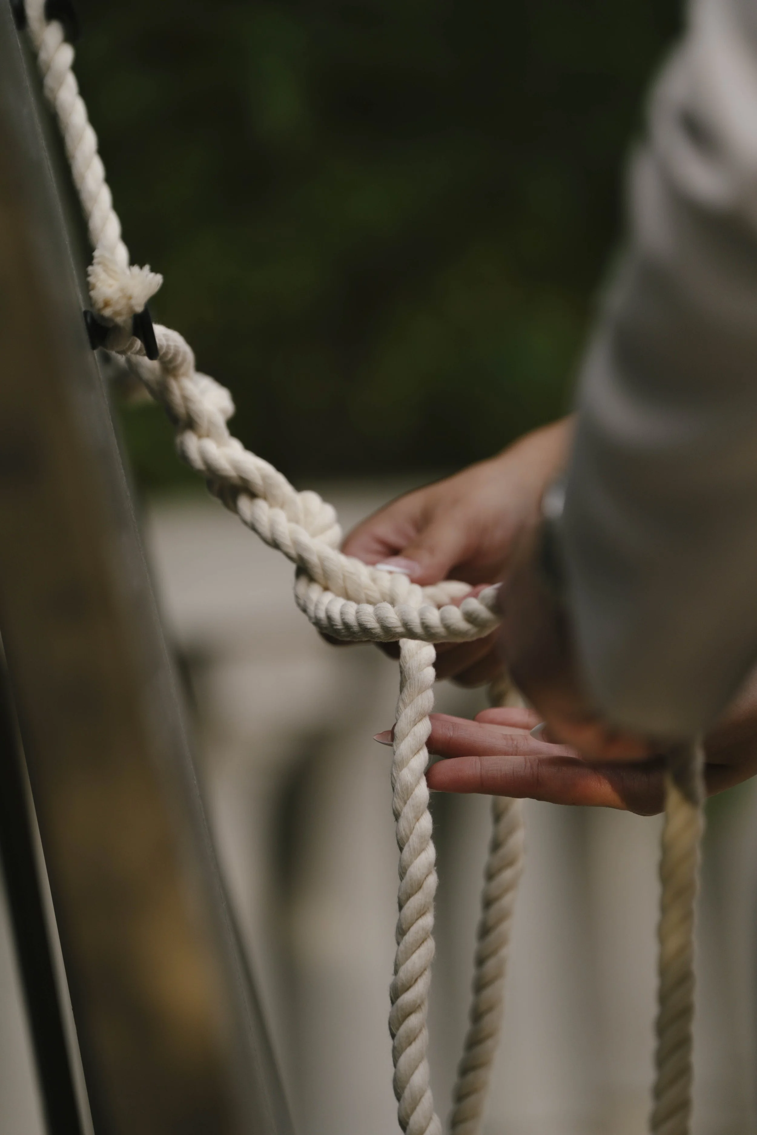 The bride and groom’s ceremony at Ashley Castle in Chandler, Arizona, was beautifully documented through hybrid film and digital photography, capturing their vows, ring exchange, and heartfelt moments beneath a romantic floral altar in the castle’s e