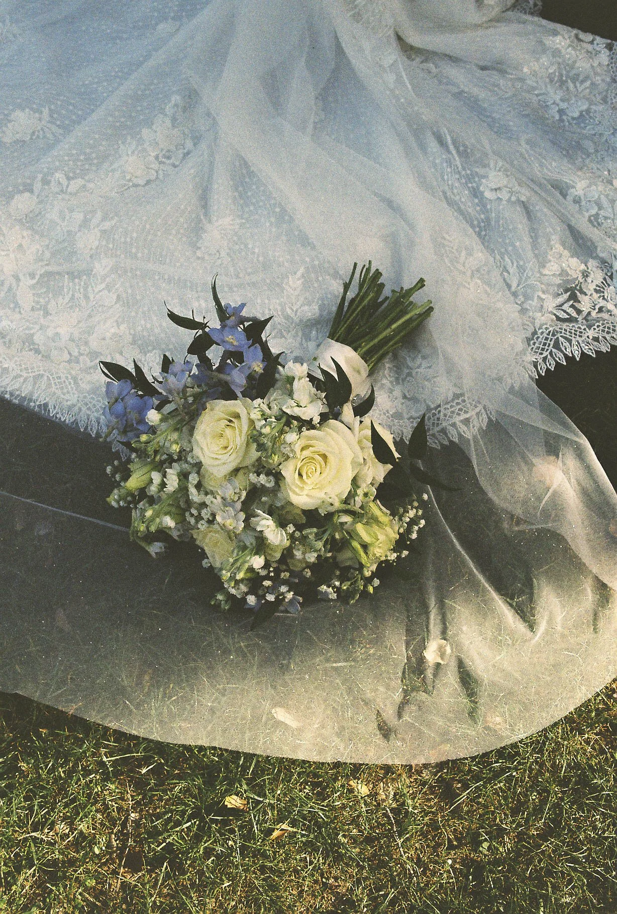 Romantic bride and groom portraits at Ashley Castle in Chandler, Arizona, captured through hybrid film and digital photography, showcase intimate newlywed moments filled with emotion, elegant garden backdrops, and timeless wedding-day connection.