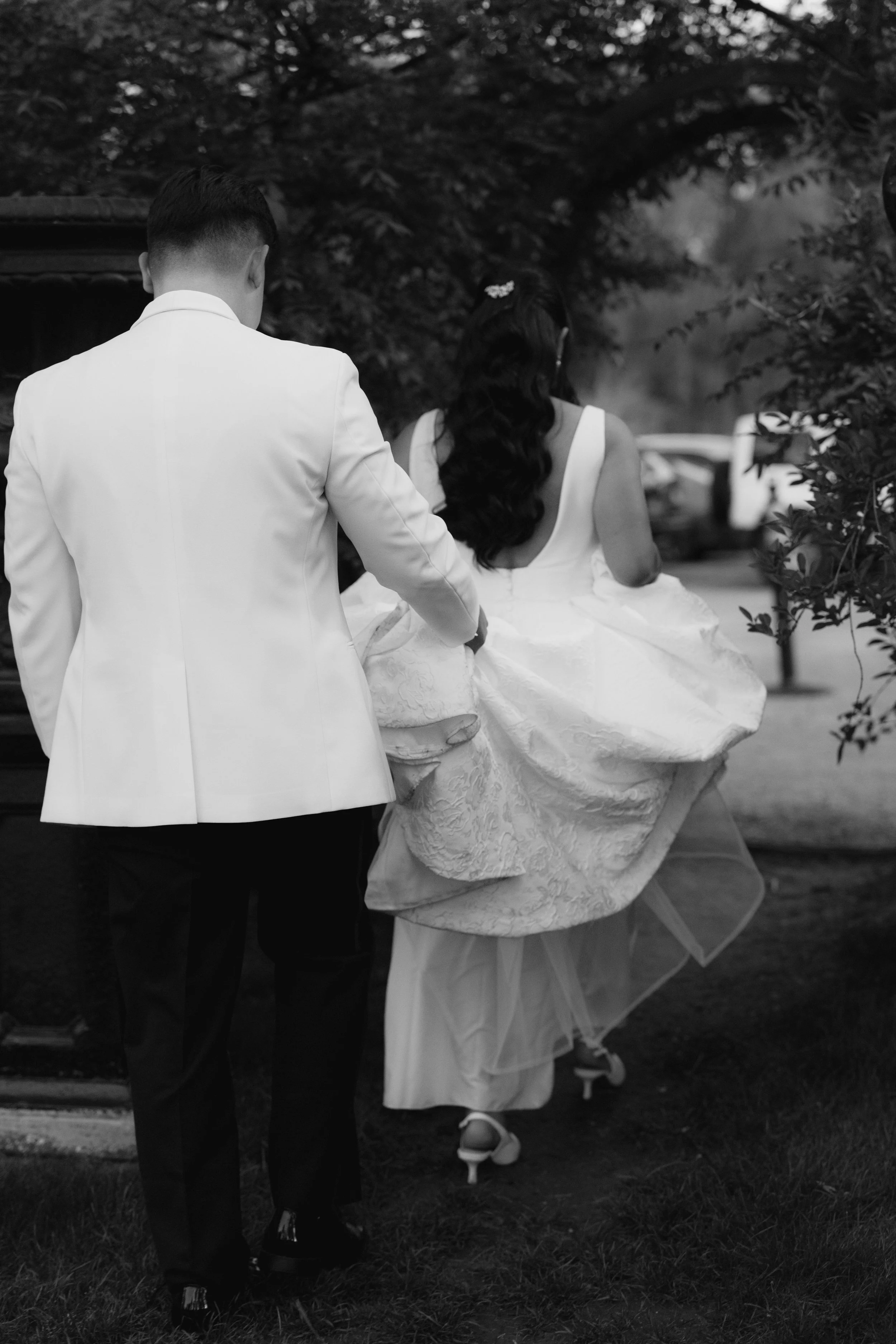 As the sun began to set, the bride and groom stepped away for golden hour portraits around the grounds of Hotel DuVillage. Captured on both digital and 35mm film, these sunset portraits highlight the warmth, romance, and quiet moments shared between 