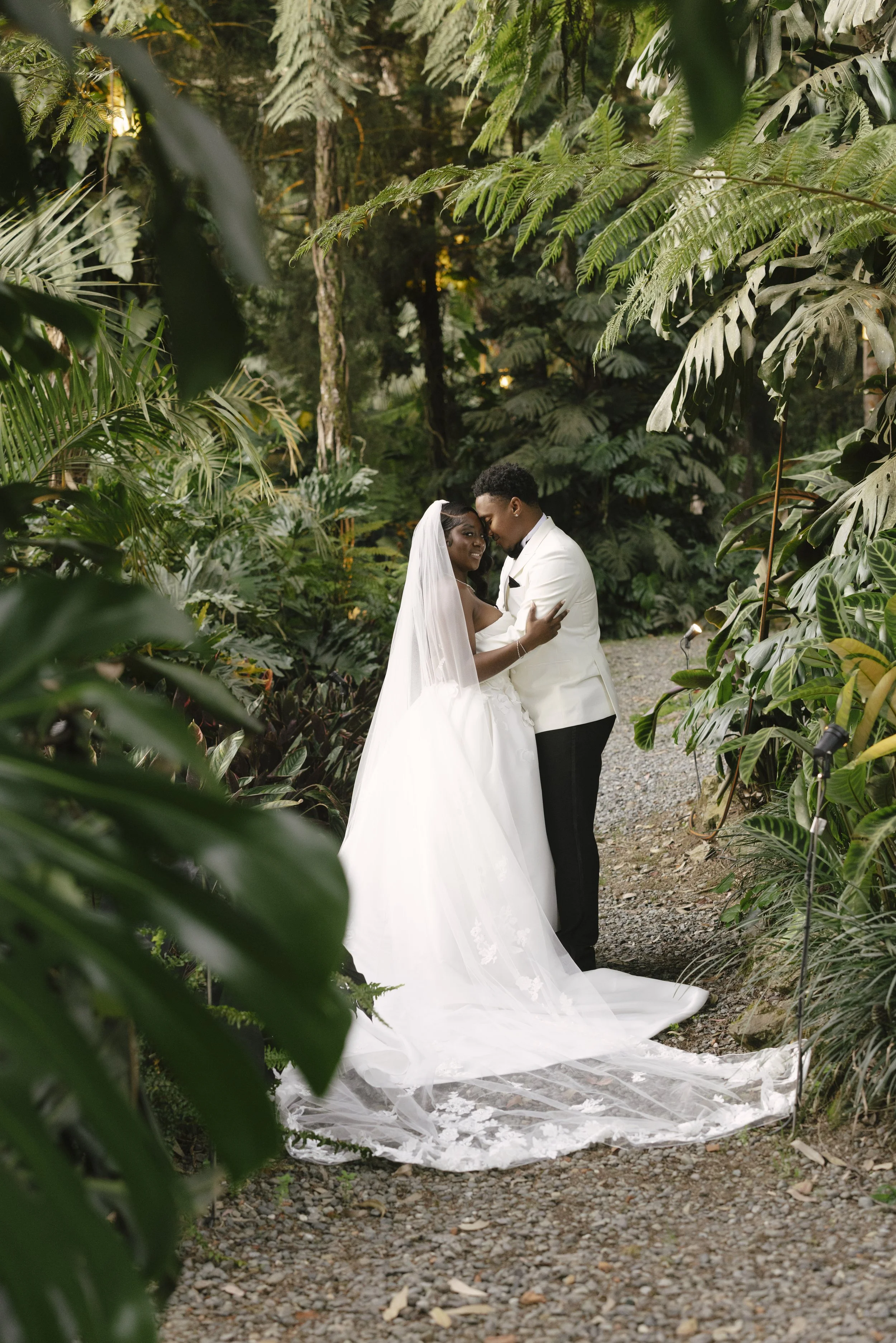 Bride and groom portraits at Forest Campestre in Medellín, Colombia featuring romantic destination wedding photography, lush tropical gardens, bridal party portraits, and natural, documentary-style moments.