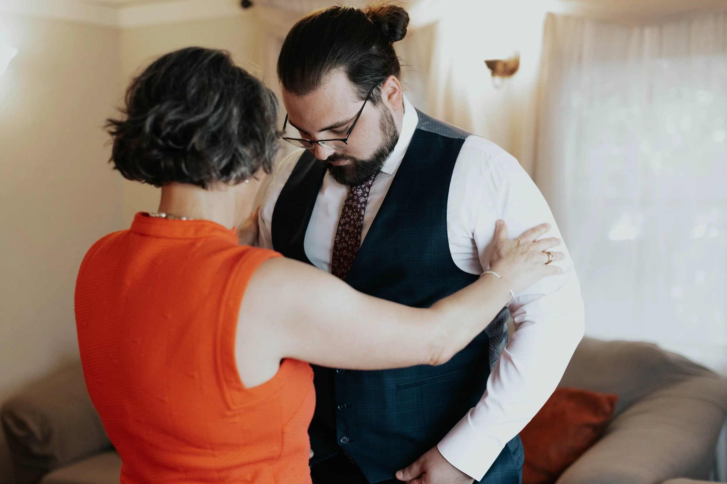 The morning began with quiet getting-ready moments and wedding detail photos before the ceremony at the Boojum Tree in Phoenix. From the bride’s dress and rings to personal touches shared throughout the space, every detail reflected Lauren & Joel’s b