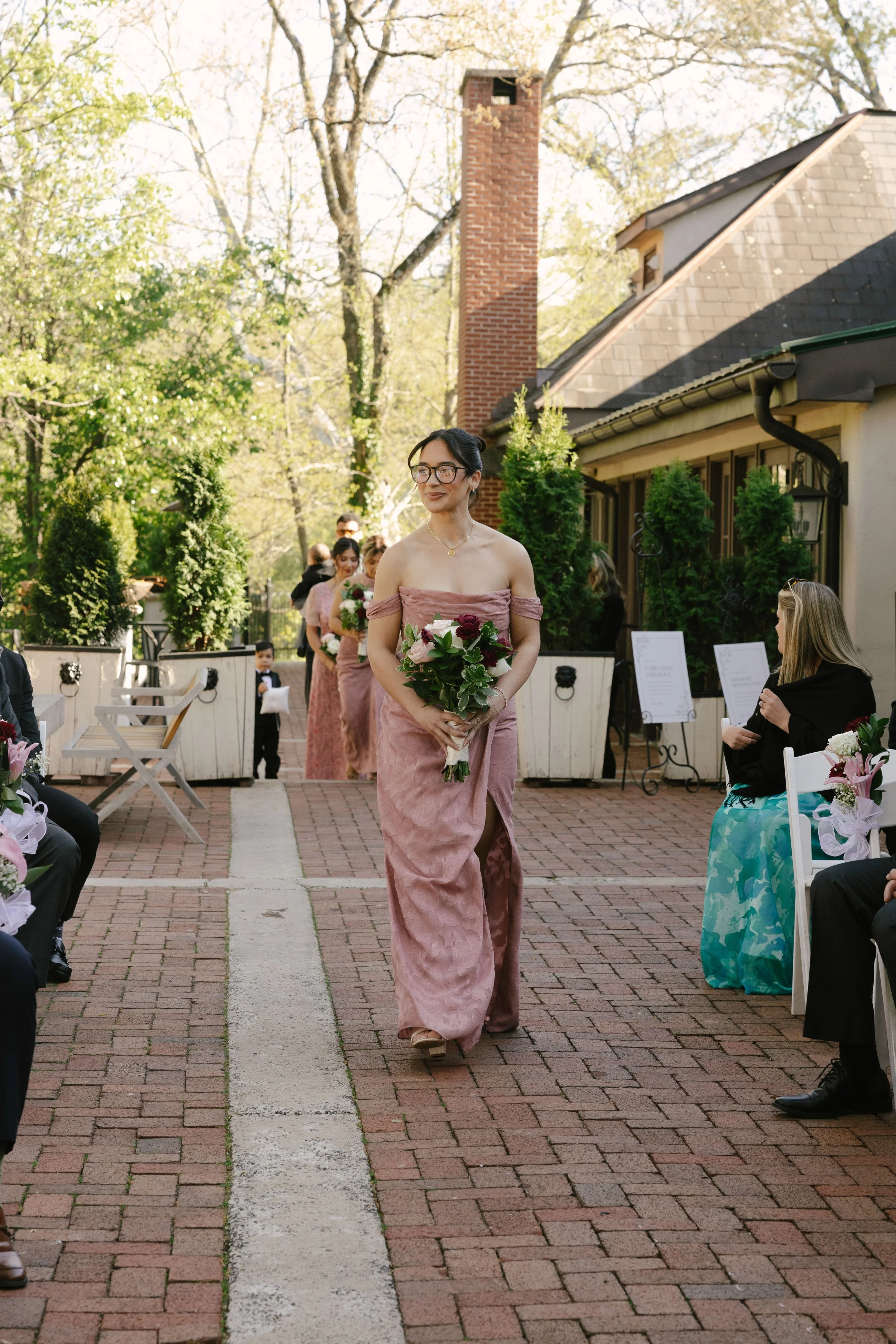Outdoor wedding ceremony at Hotel DuVillage featuring the bride and groom, wedding party, and meaningful moments captured on both digital and 35mm film. A timeless celebration documented with a candid, documentary approach
