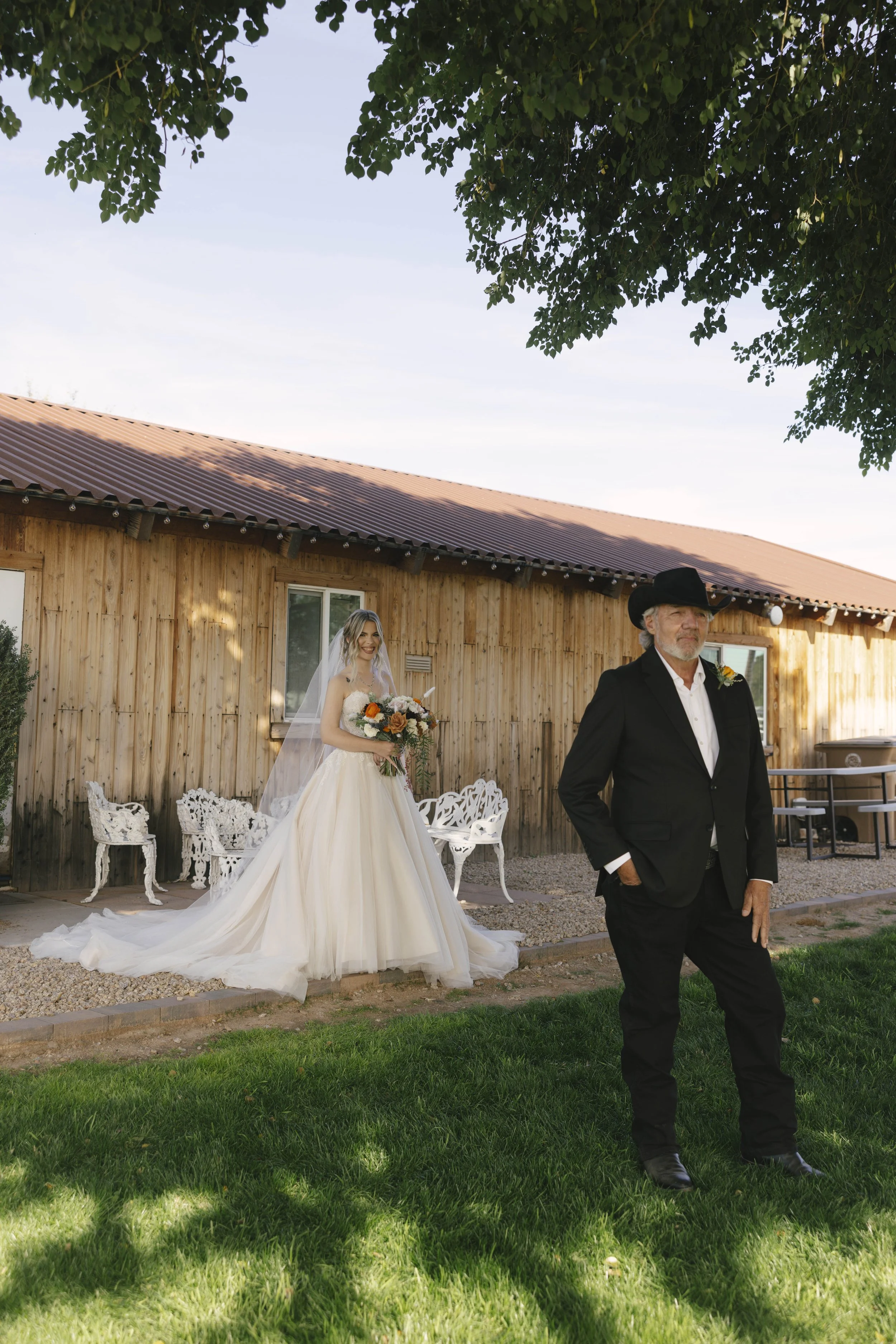 Candid wedding photography from a December wedding at The Knotty Barn in Queen Creek, Arizona, photographed by Raw By Laura, highlighting natural emotion, rustic details, and warm desert tones.
