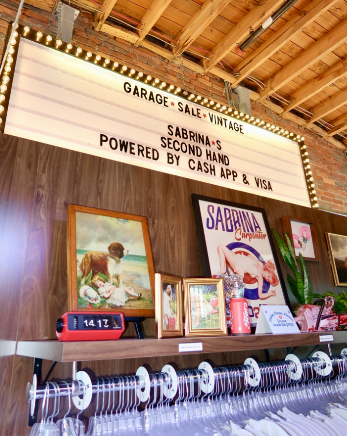 Custom Sabrina Carpenter Second Hand pop-up at Garage Sale Bar display featuring Cash App branding, vintage decor and an interactive photo area in Nashville. Copy