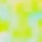 Blurred abstract background with green and yellow hues.