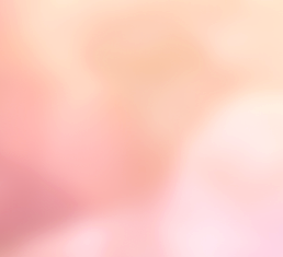 Blurred abstract background with pink, peach, and light cream tones.