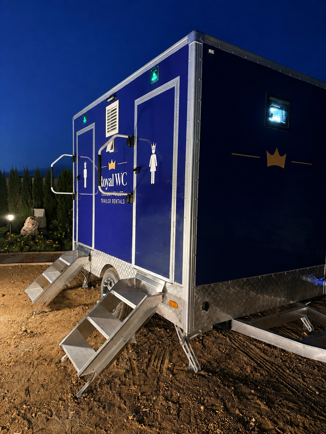 Royal WC Estate Collection trailer with copper interior panels and premium fixtures. With air condition, flushing toilets and bluetooth music.