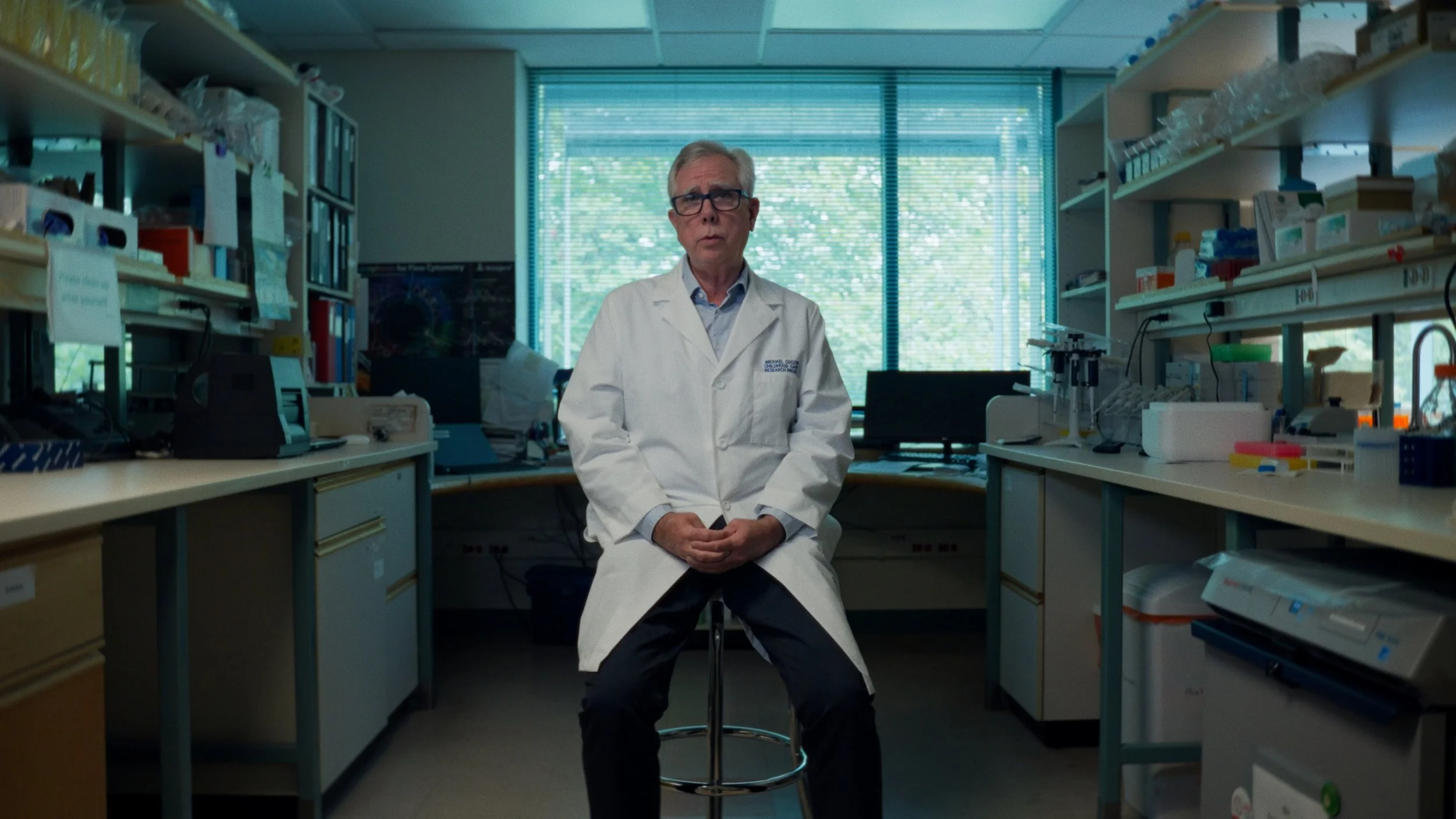 Researcher speaking in a laboratory in the BC Children's Hospital Foundation brand film about childhood cancer research.