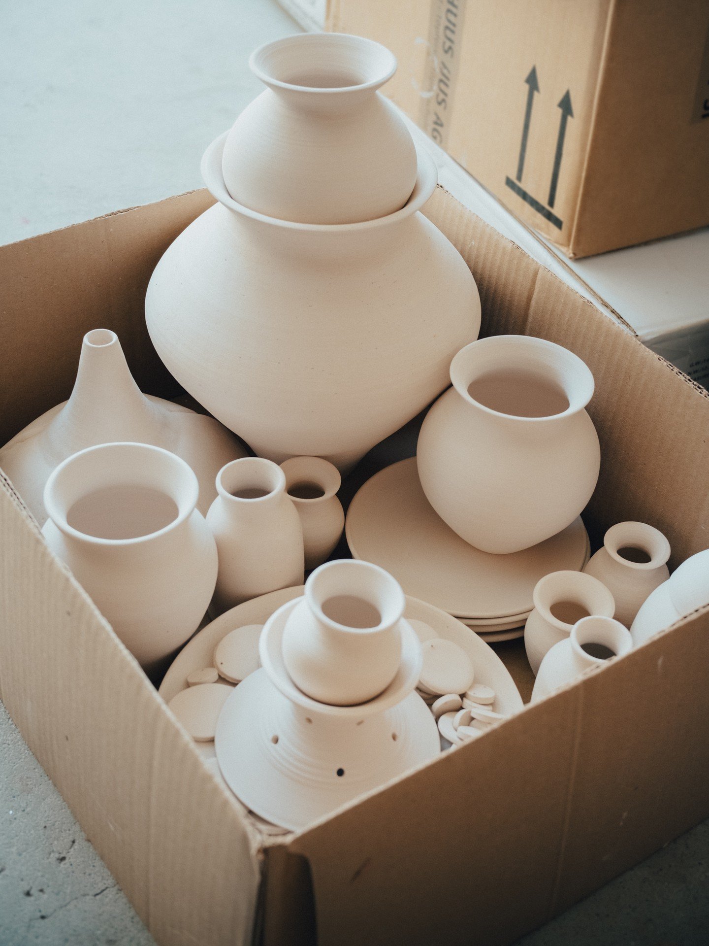 This is an appreciation post for my parents, who have to deal with boxes like these lying around in their garage, where my kiln lives. Walking circles around my pots and tools every day.

And somehow, I'm more confident leaving stuff like this on the
