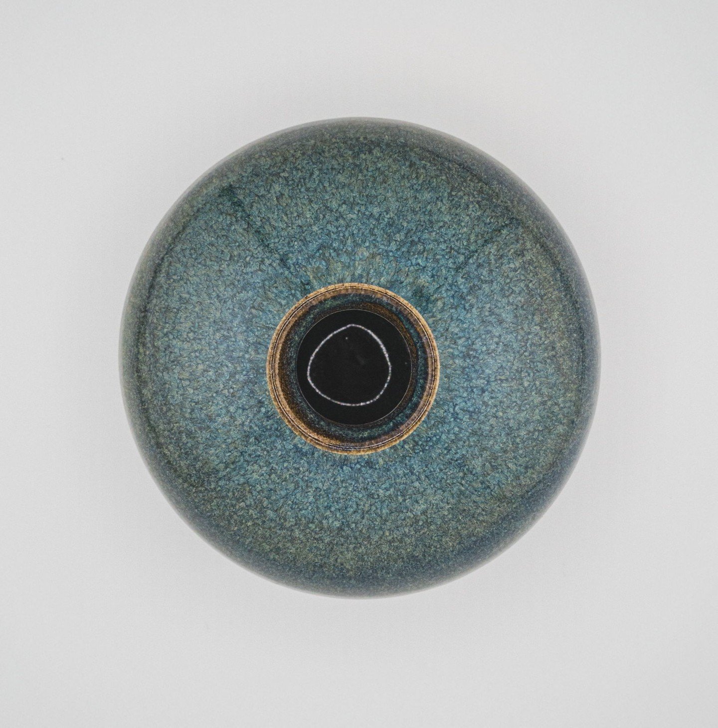 Here's Sea Drift, another one of my own formulated glazes.

This one used to be one of my favorite vases. Used to, because I tried firing it a second time, which didn't end up going well.

It's often quite a gamble trying new things on pieces I alrea