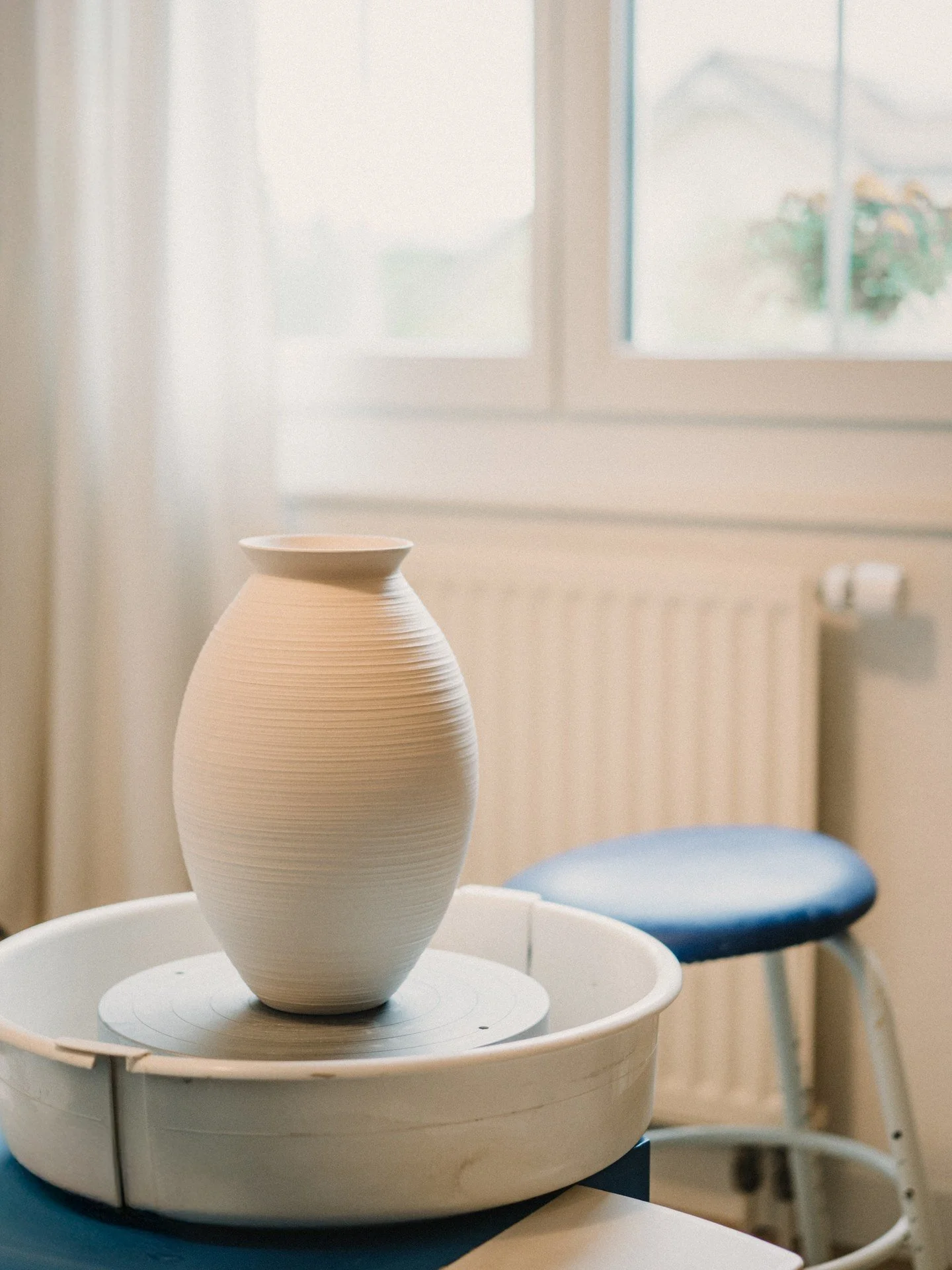 This must have been my first vessel where I had to stand up to be able to throw it and reach all the way to the bottom.

I actually failed the rim at least twice and had to cut it and re-collar the top, which made it shorter than it was originally su