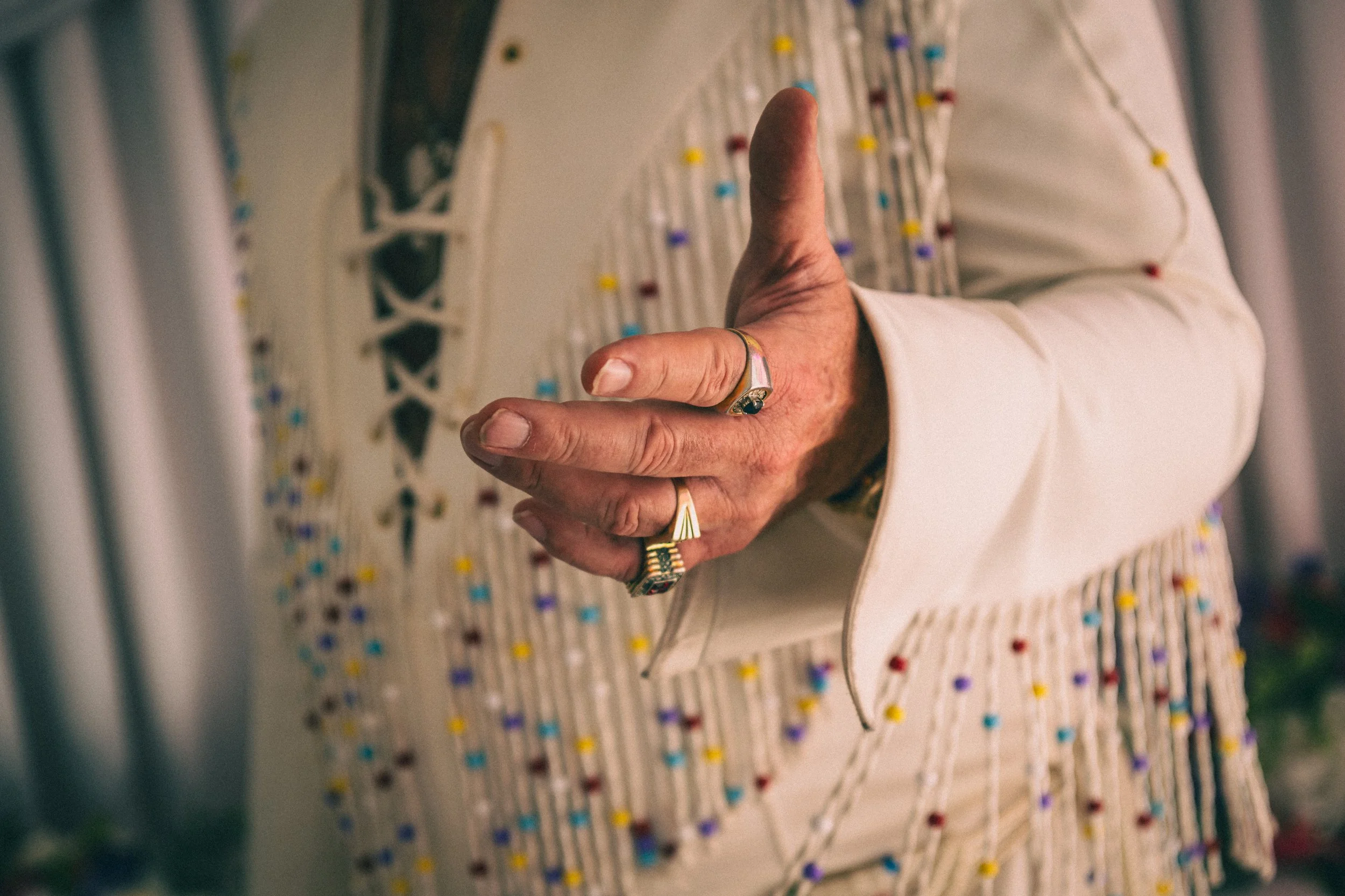 Image of Elvis offering a helping hand.