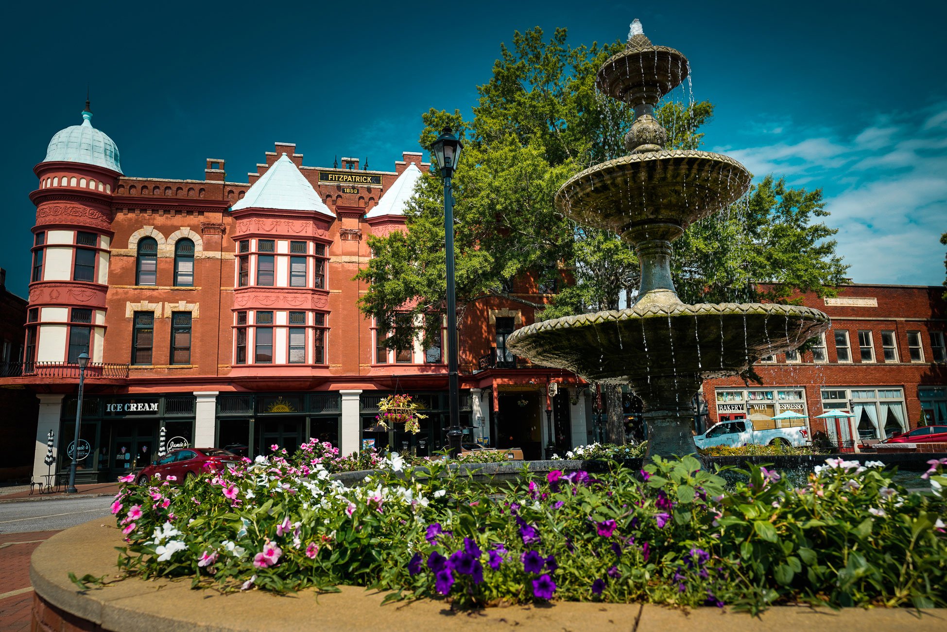 Historic Washington, Georgia, with fountain, flowers, and the Fitzpatrick Hotel.