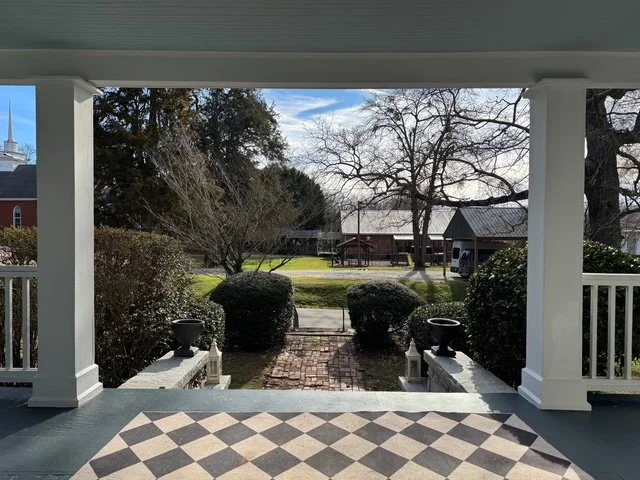 A beautiful residential view from a historic porch in Lexington, Georgia