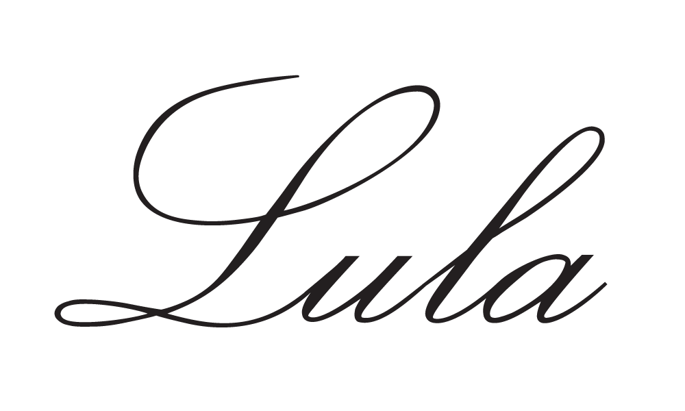 The word 'Lula' written in elegant, cursive black script on a black background.