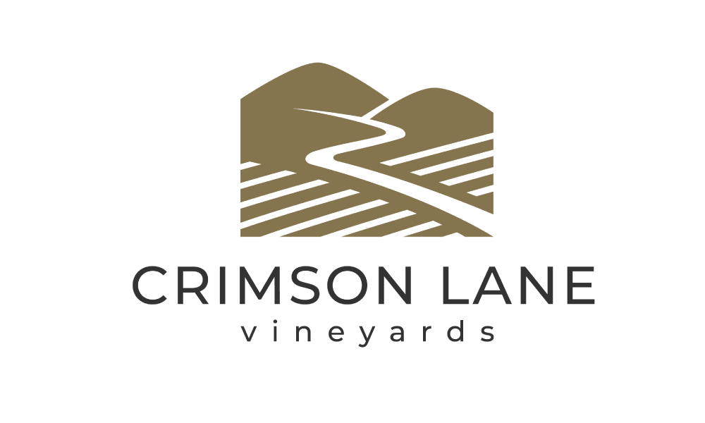 Logo of Crimson Lane Vineyards featuring stylized vineyards and hills