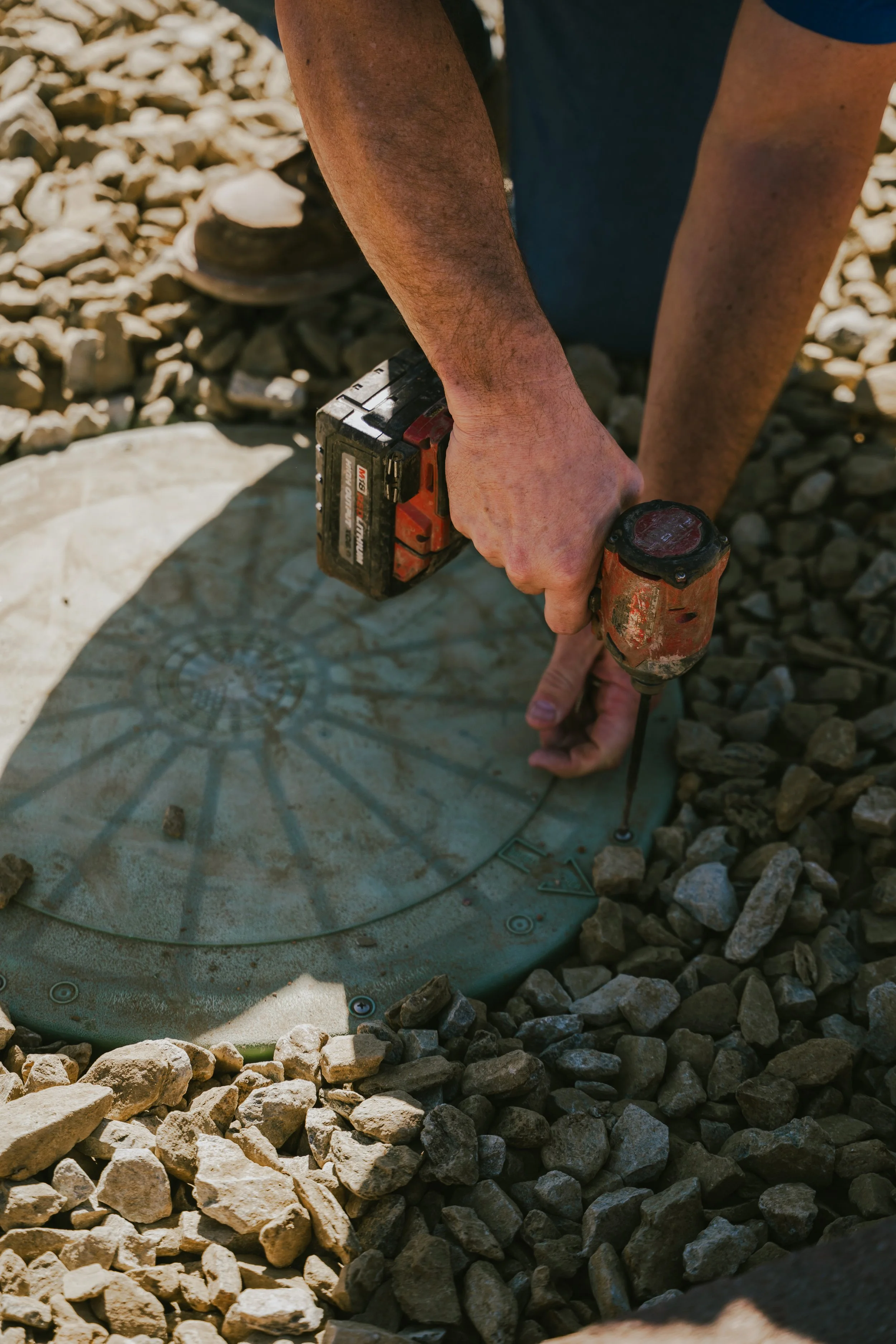 JT's Septic installing new septic tank lids in Arizona.
