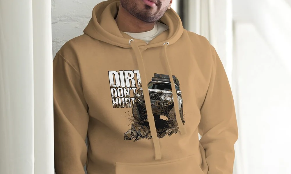 a lifestyle image of a man wearing a custom gxor tee hoodie.