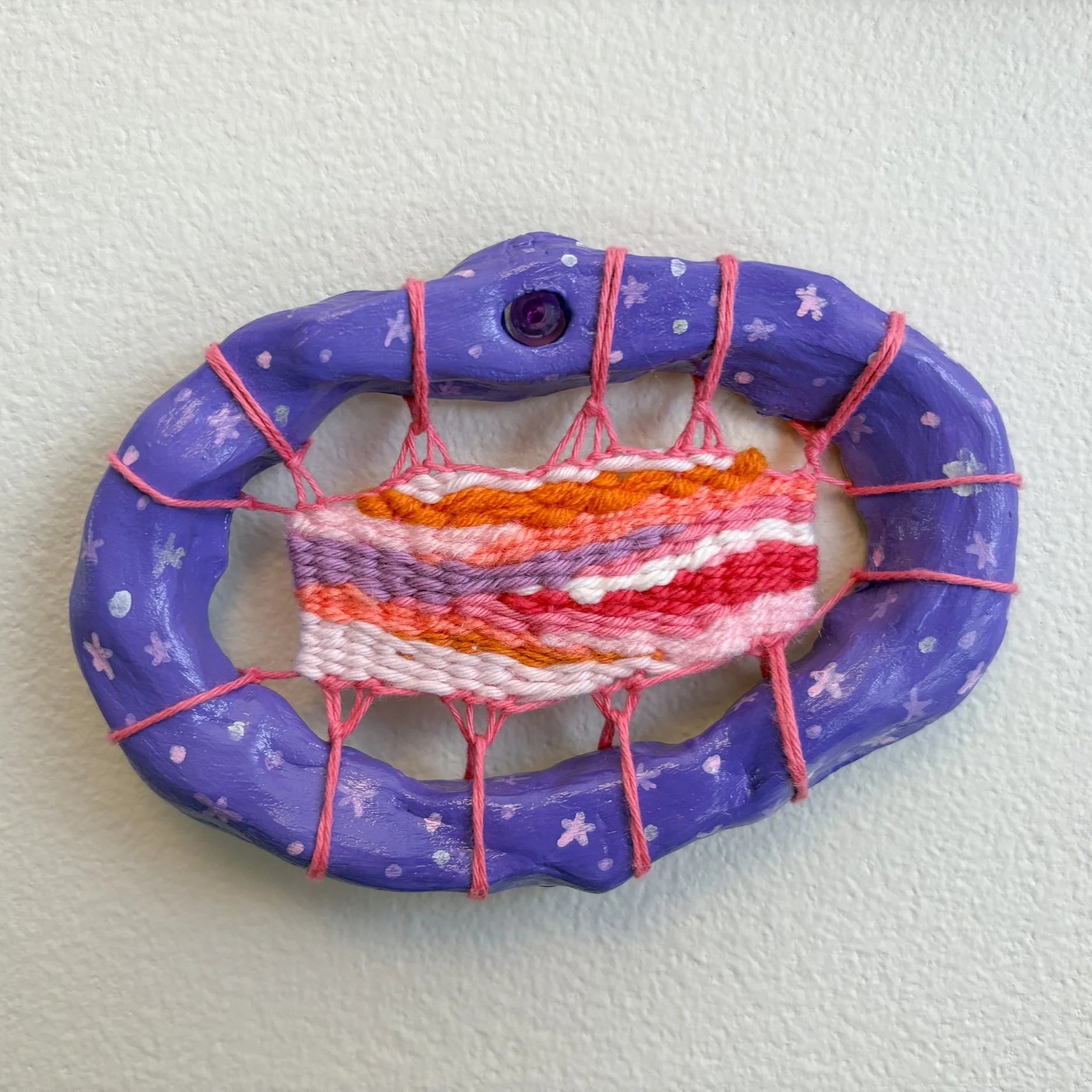 Custom small portal. Tell me your favorite colors or give me an intention to tune into for this piece! ---- Portal frames are made of air-dry clay and acrylic paint. Interiors are woven with assorted yarns and threads on a warp wrapped around the fra