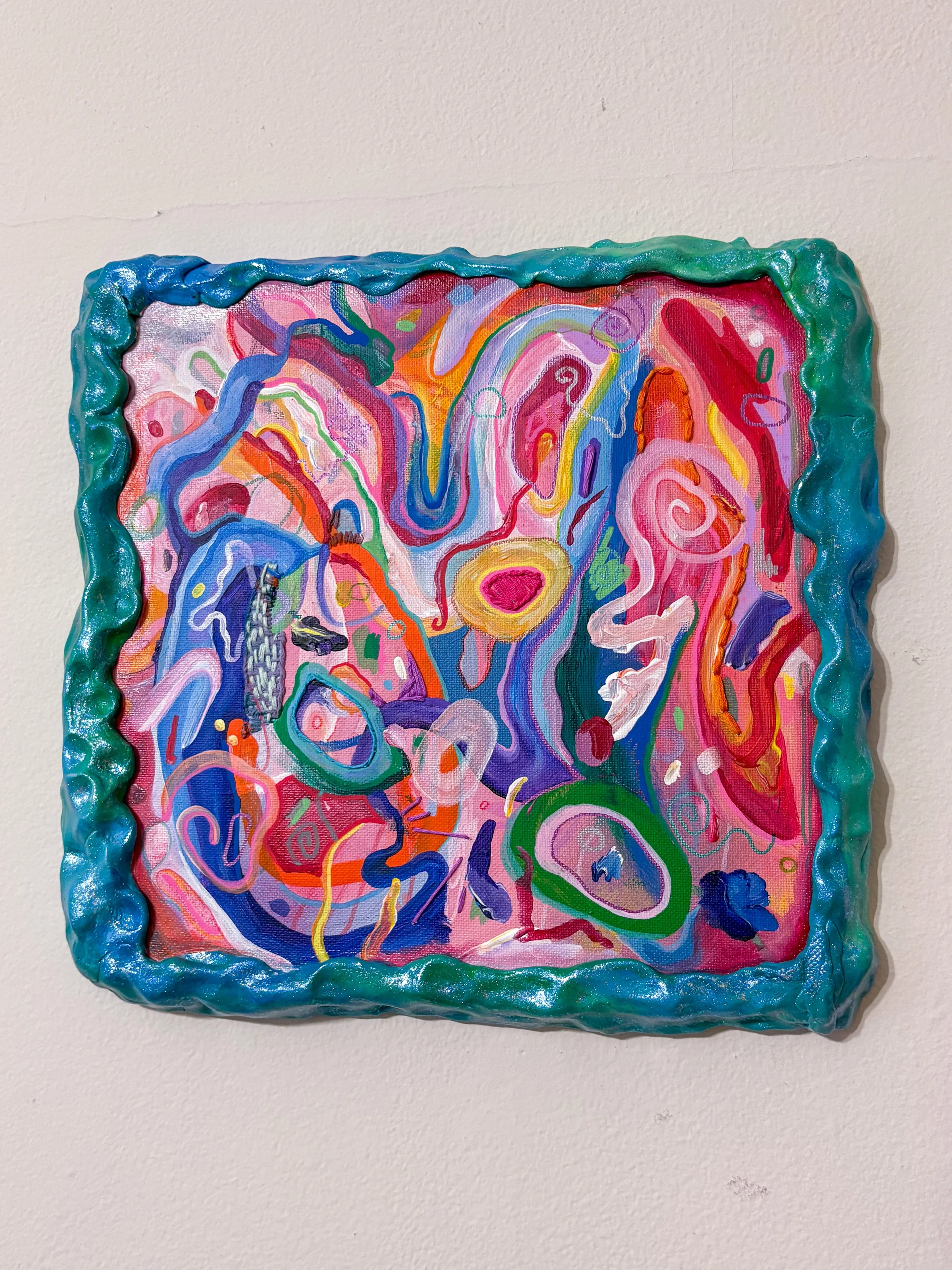 Untitled (2026). Acrylic, pen, marker, embroidery thread, glitter, nail polish, foam clay, and beads on canvas. 10.75" x 11" x 1". 