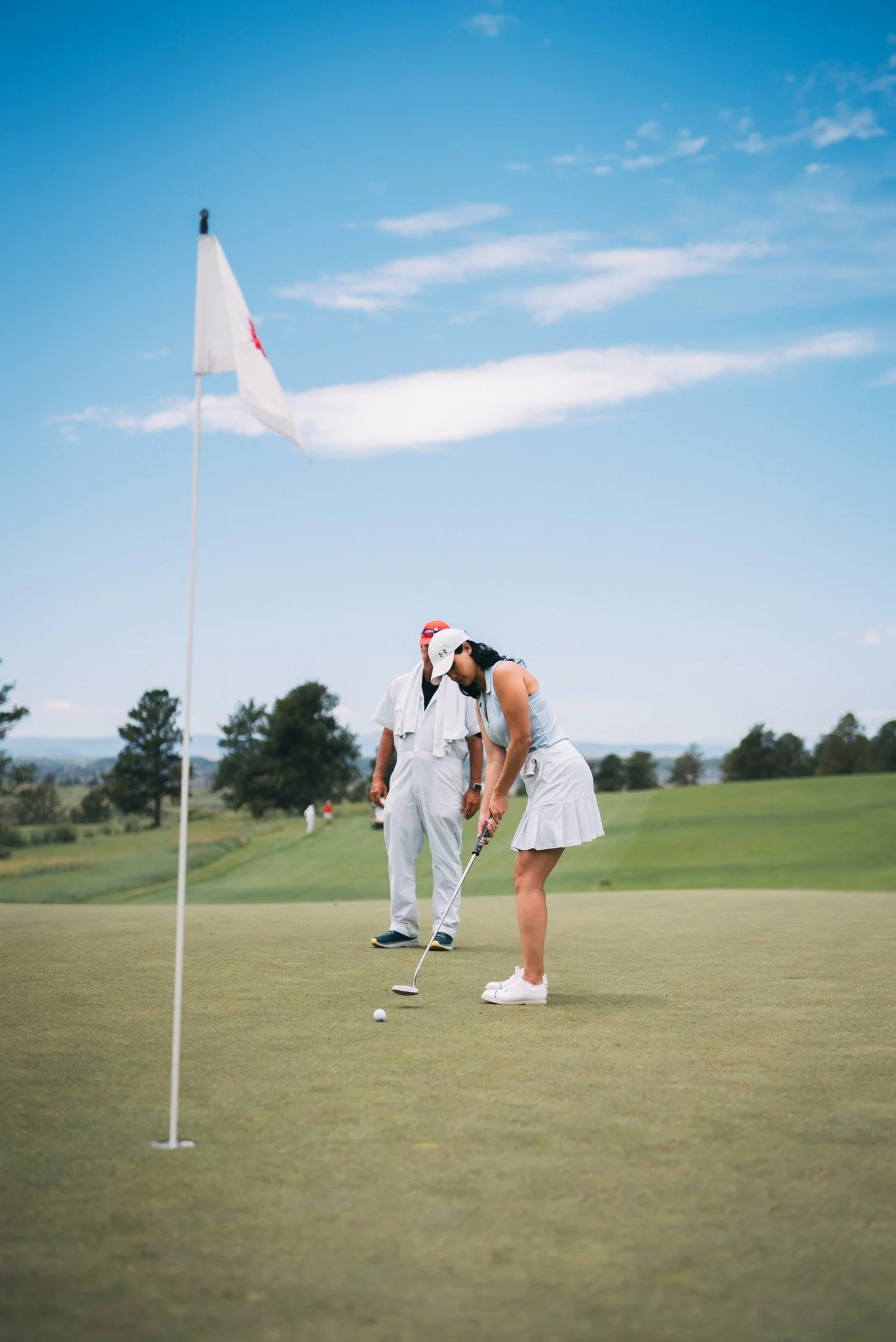 Golfer putting on green during Leaders Fore Golf event