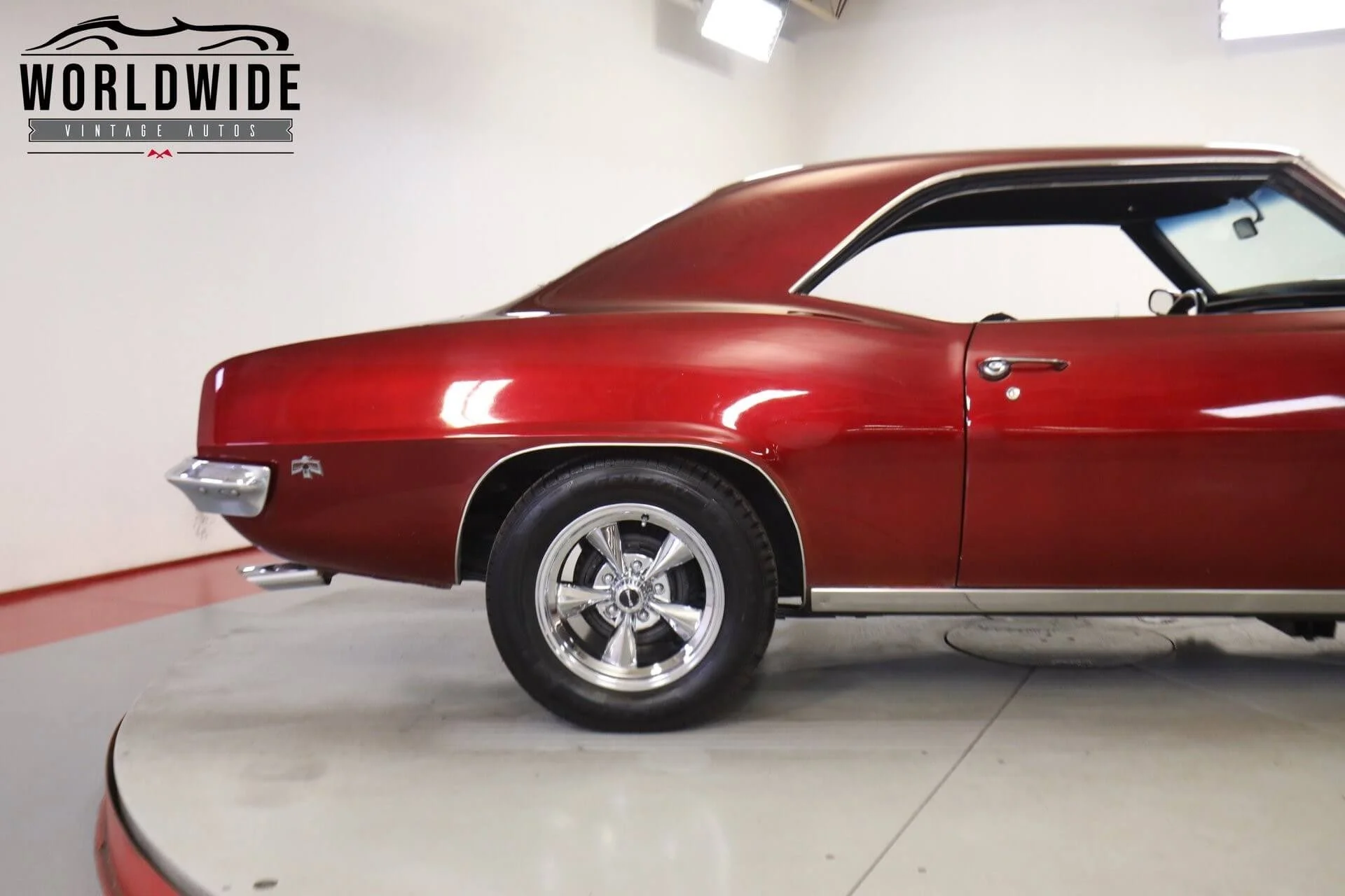 Rear side view of 1969 Pontiac Firebird raffle car supporting Denver Children’s Foundation