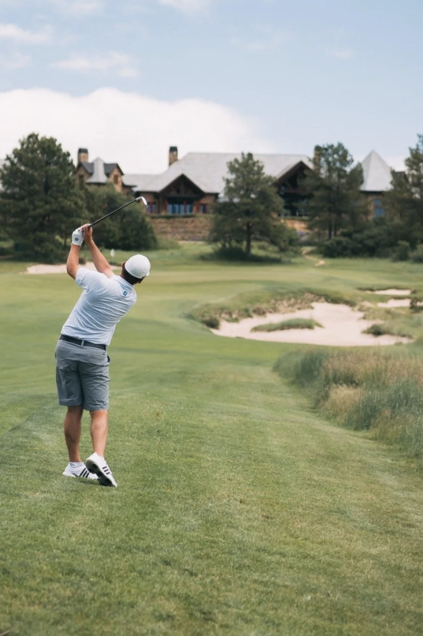Participant playing at the Denver Children’s Foundation charity golf tournament
