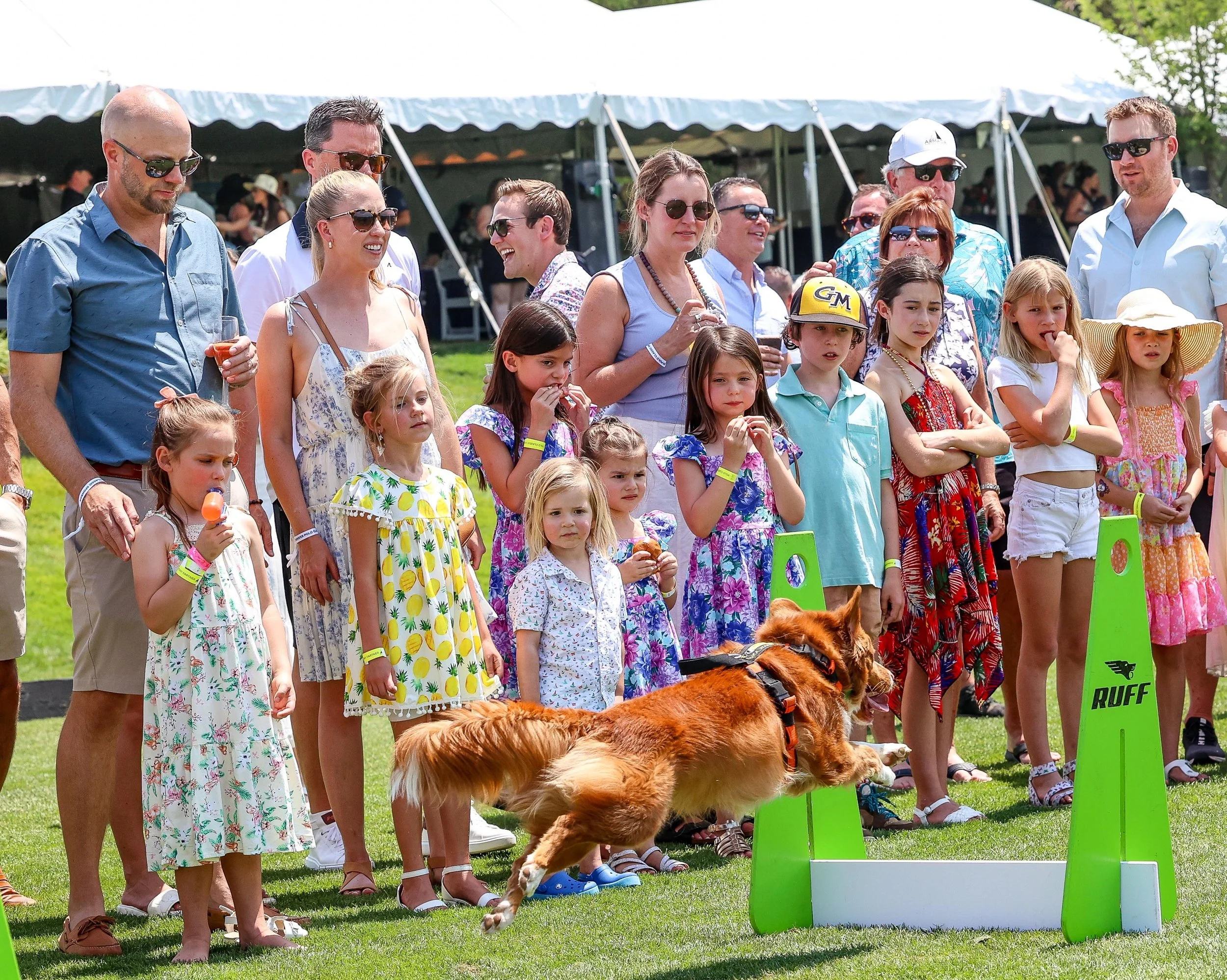 Children and families enjoying activities at Denver Polo Classic Family Day benefiting Denver Children’s Foundation