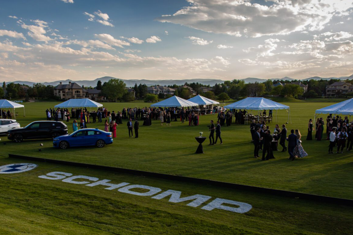 Guests attending a Denver Children’s Foundation outdoor fundraising event