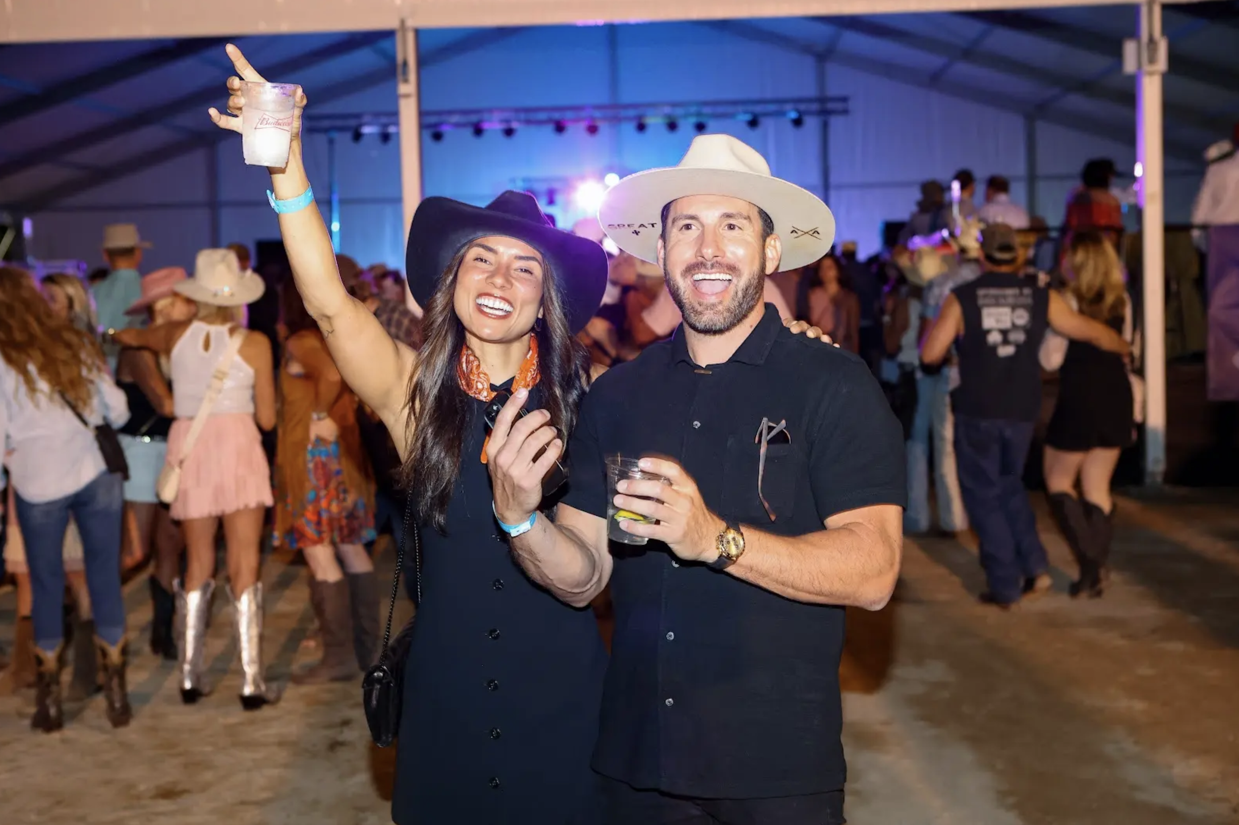 Guests enjoying drinks and live music at the Denver Children’s Foundation Barn Party