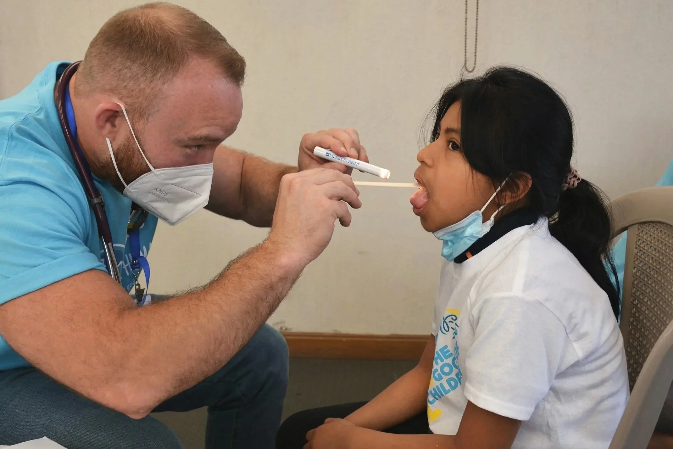 Child receiving a health screening supported by Denver Children’s Foundation health and wellness initiatives