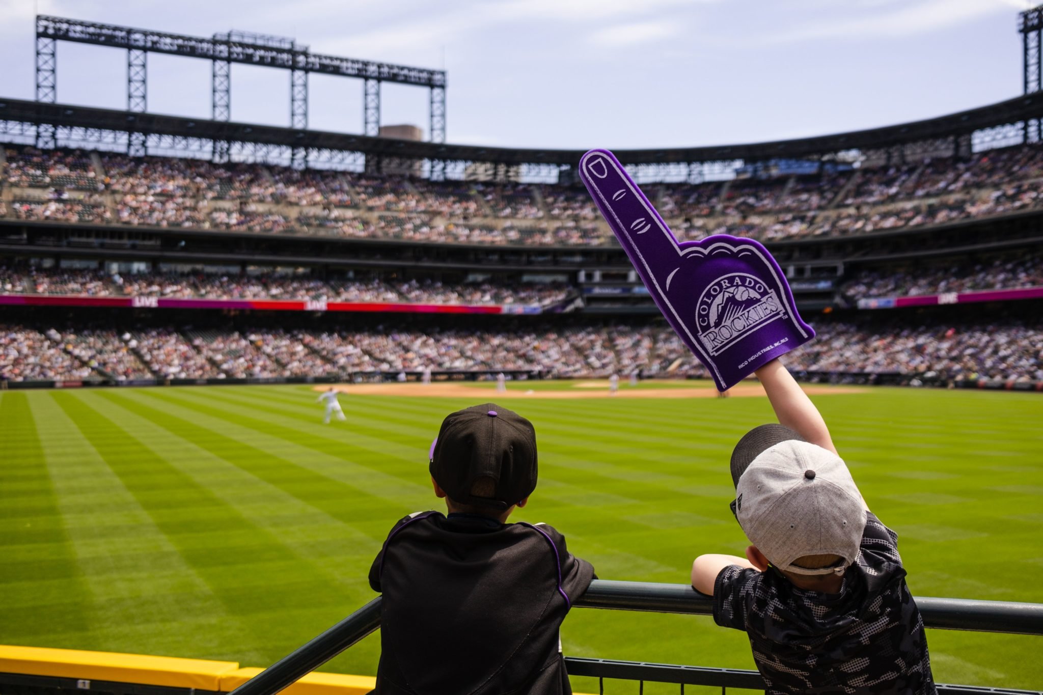 Fans at Colorado Rockies game supporting Saves for Kids benefiting Denver Children’s Foundation