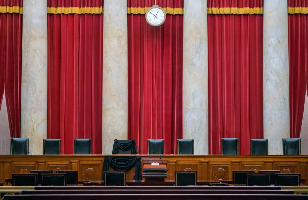 Justice Antonin Scalia's seat draped in black following his death.