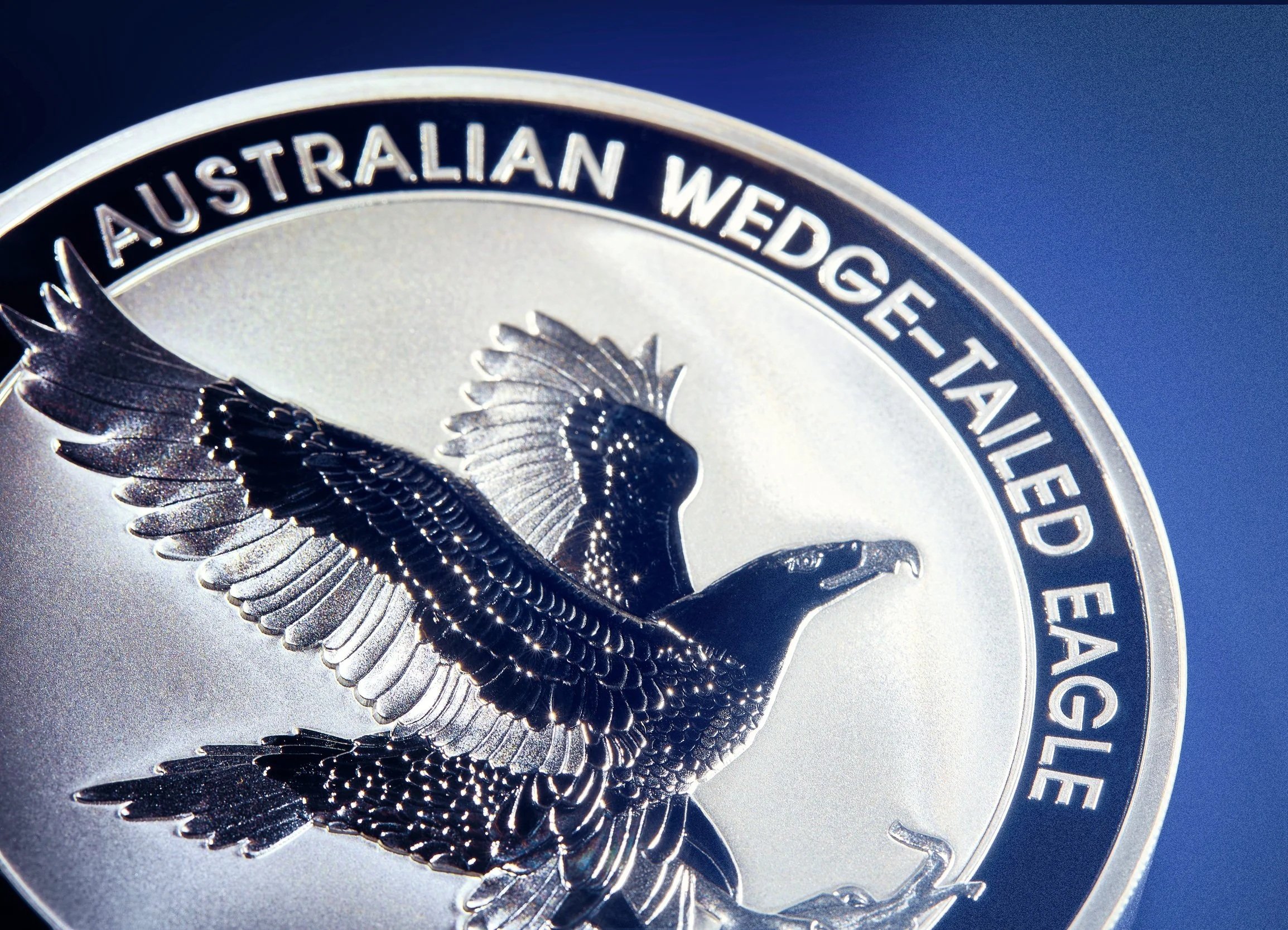 Close-up of the Australian Wedge-Tailed Eagle coin reverse designed by John Mercanti for The Perth Mint, featuring the iconic eagle in flight on a celebrated bullion coin series.