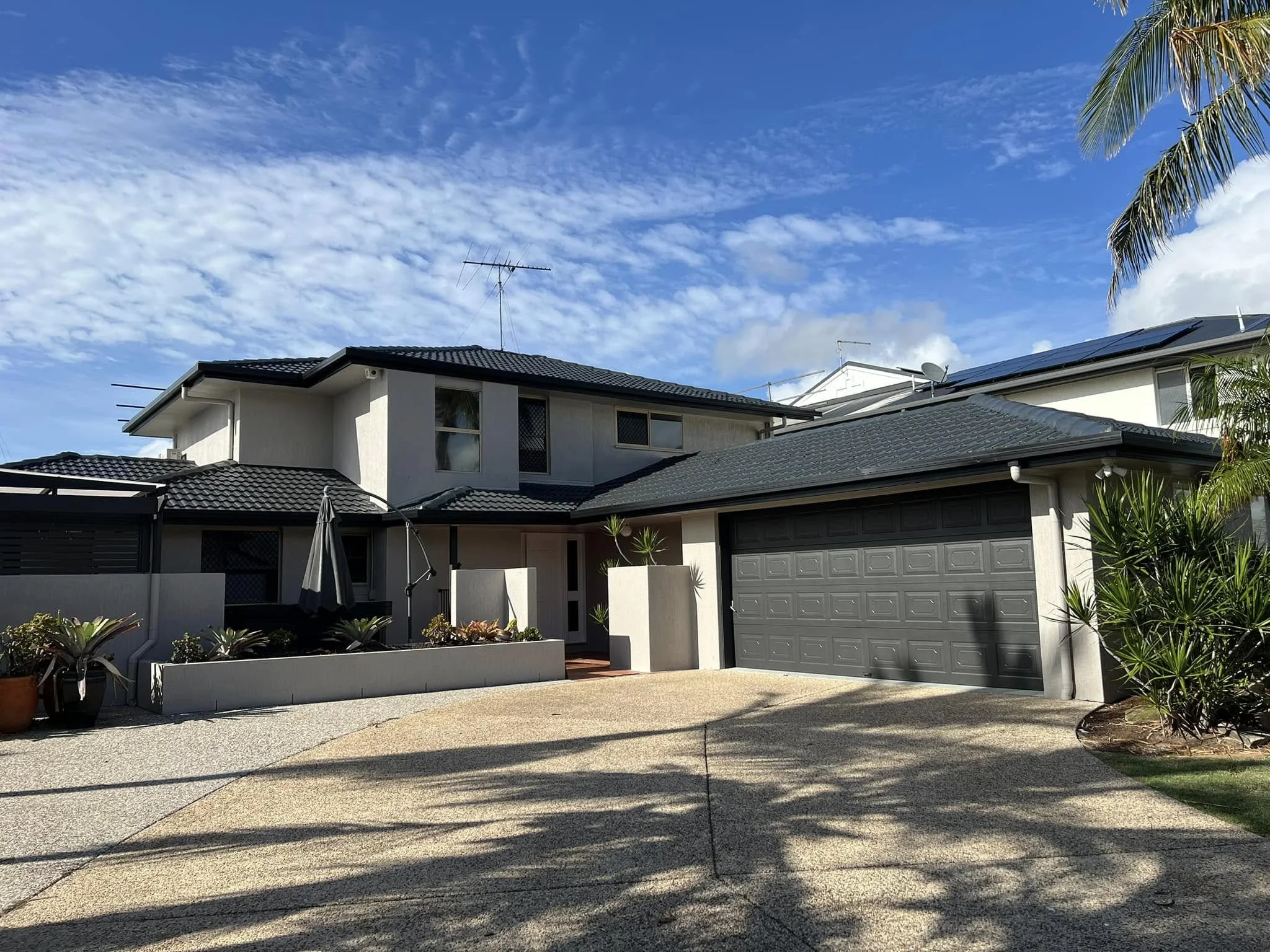 Exterior house repaint completed in North Brisbane by SJR Painting.