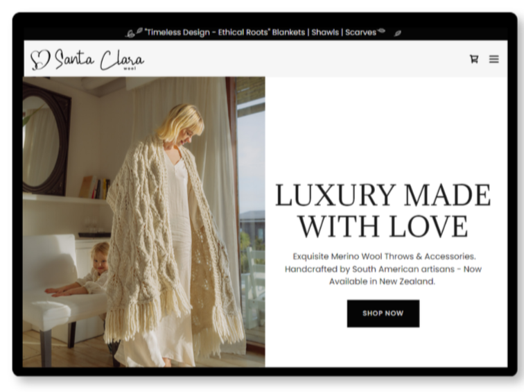 Screenshot of Santa Clara Wool website featuring a woman and child in a cozy room, showcasing luxury Merino wool throws and accessories.