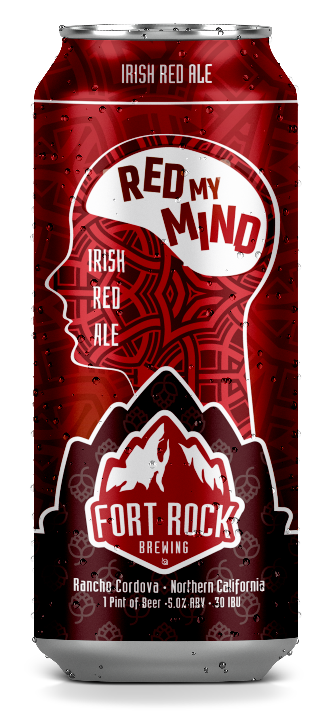 A red beer can labeled 'Red My Mind', with a design featuring a human head silhouette, mountains, and hop illustrations, promoting Irish Red Ale by Fort Rock Brewing in Northern California.
