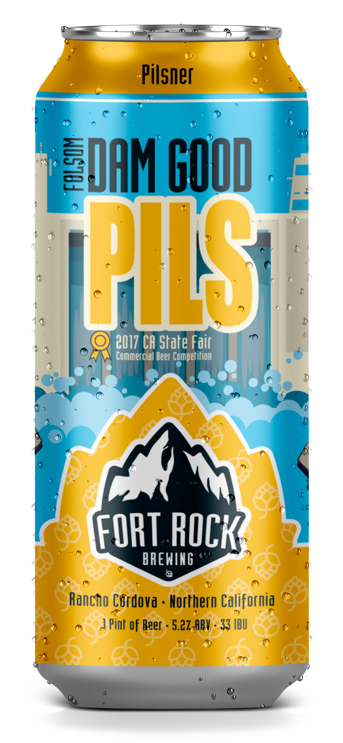 A can of Fort Rock Brewing beer with a blue, white, yellow, and black design featuring mountain imagery, hops, and the Fort Rock logo, promoting a 2017 California State Fair commercial beer competition award-winning pilsner, brewed in Rancho Cordova,