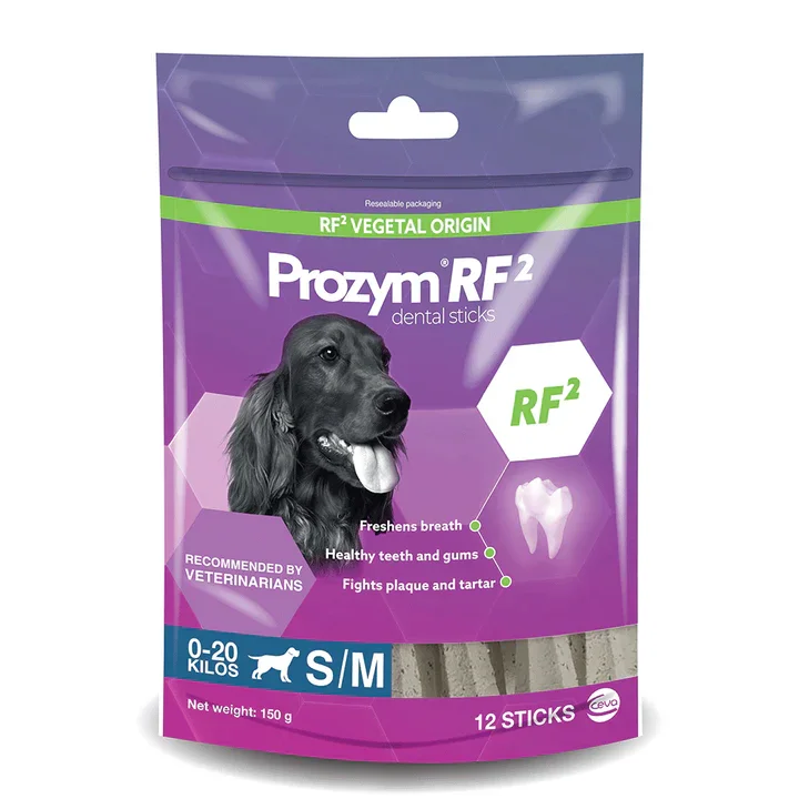 Purple packaging of Prozym RF2 dental sticks for dogs, featuring a black dog with its tongue out, indicating dental health benefits like fresh breath, healthy teeth and gums, and plaque and tartar control, recommended for small/medium dogs weighing 0-20 kilos, containing 12 sticks.