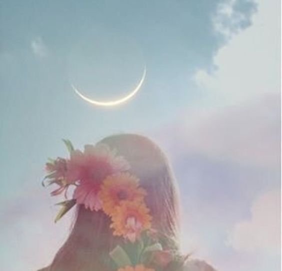 Person with a flower crown looking up at a crescent moon in the sky.