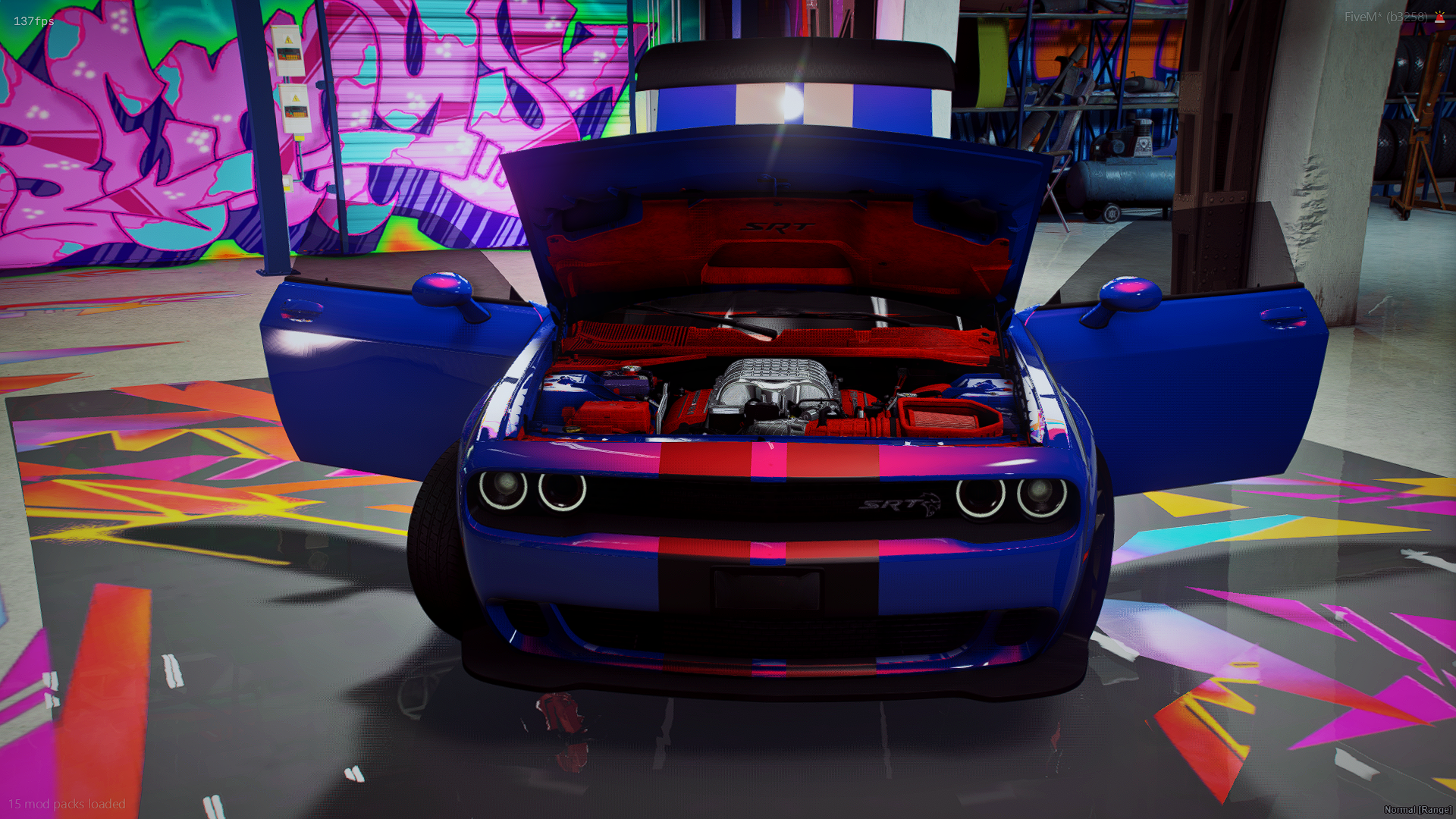 A blue sports car with an open hood revealing a red engine inside, parked indoors with open doors, colorful graffiti-style wall art, and a neon-lit environment.