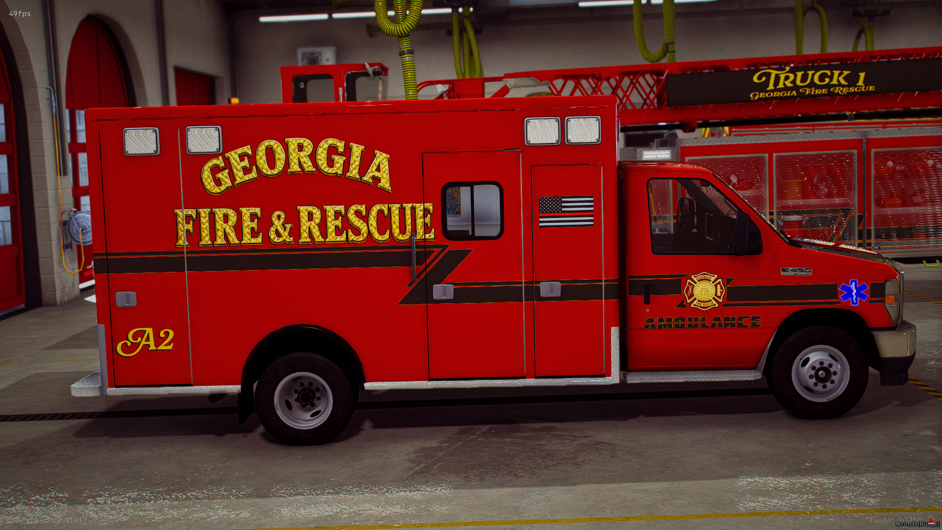 A red Georgia Fire & Rescue emergency vehicle with an American flag decal and a blue medical symbol parked inside a fire station garage.