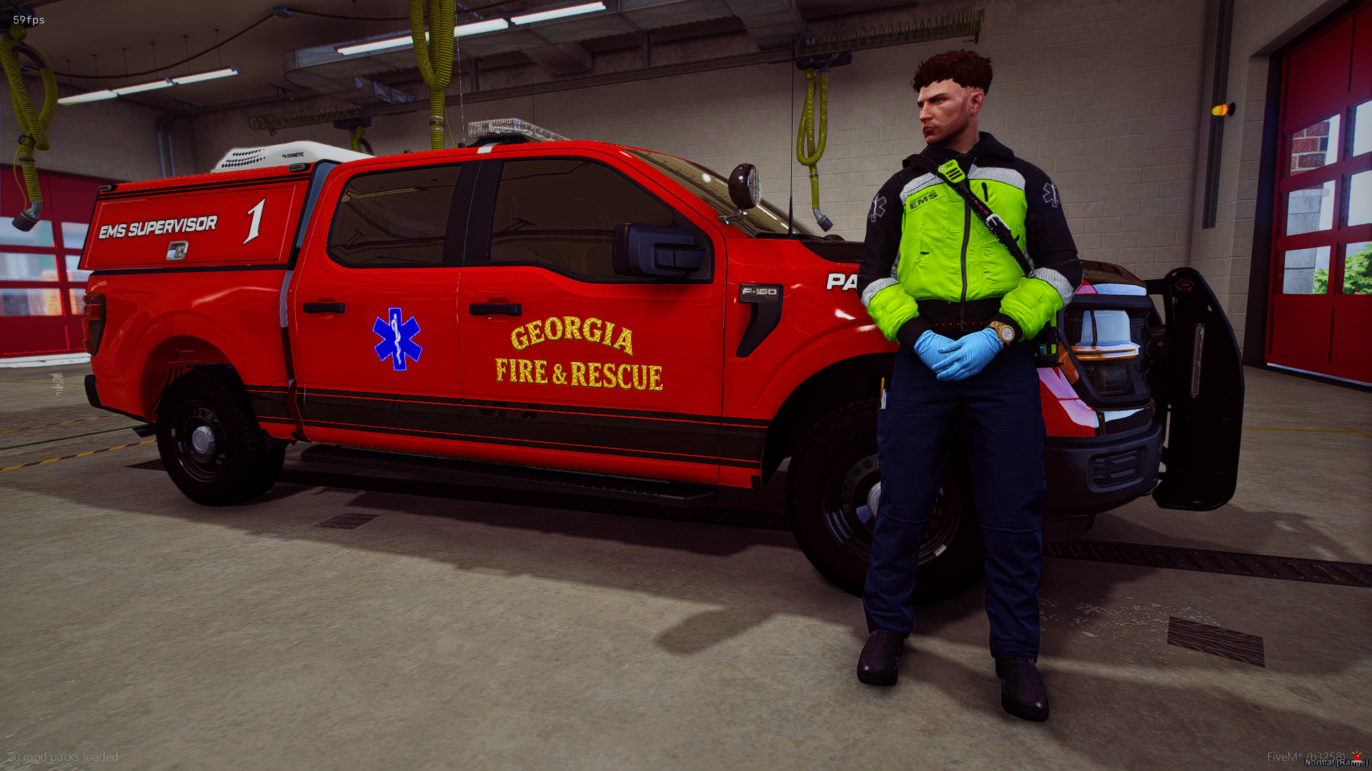 A firefighter stands in front of a Georgia Fire & Rescue emergency vehicle inside a fire station. The firefighter is dressed in a black and neon yellow uniform, wearing blue gloves, and holding a walkie-talkie. The emergency vehicle is red with blue 