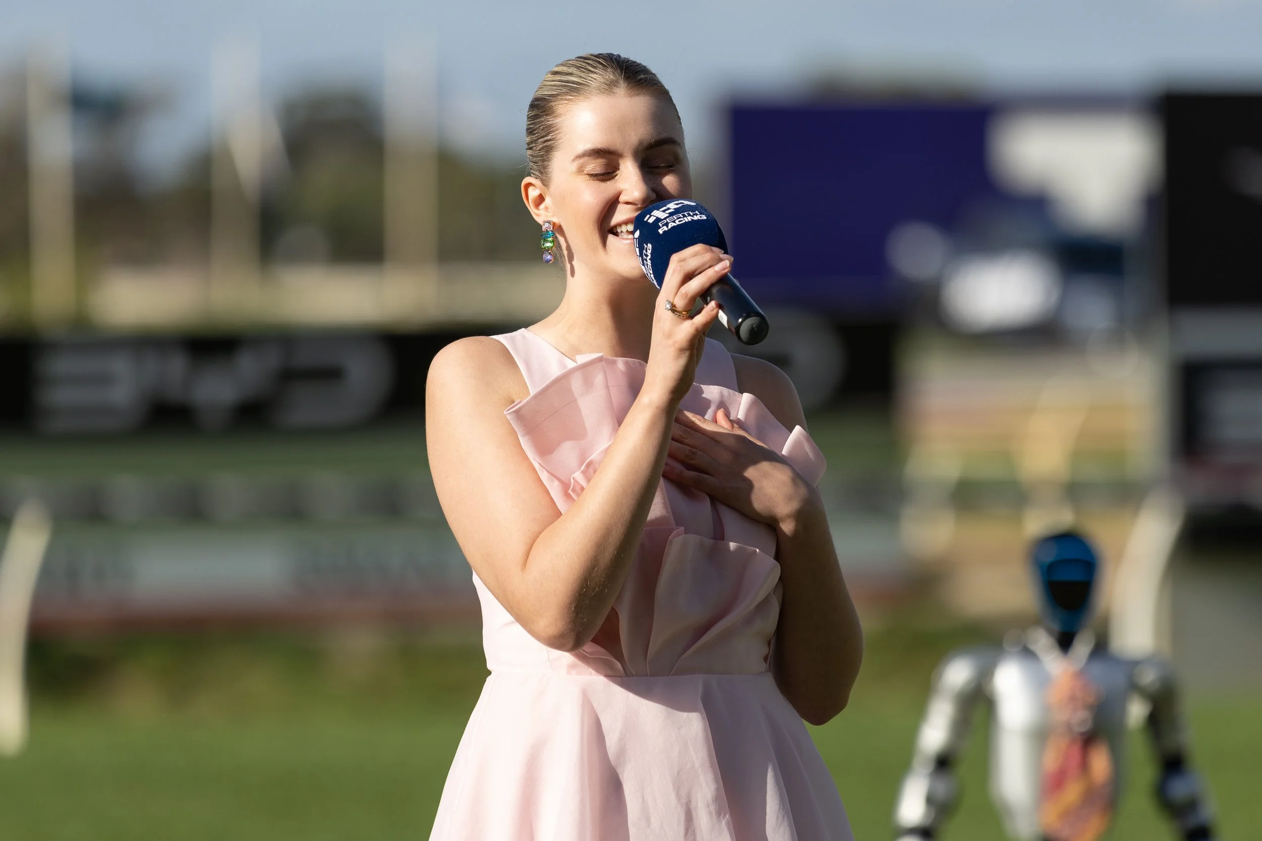 Stella Kelly performing the National Anthem at the BYD Quokka Day