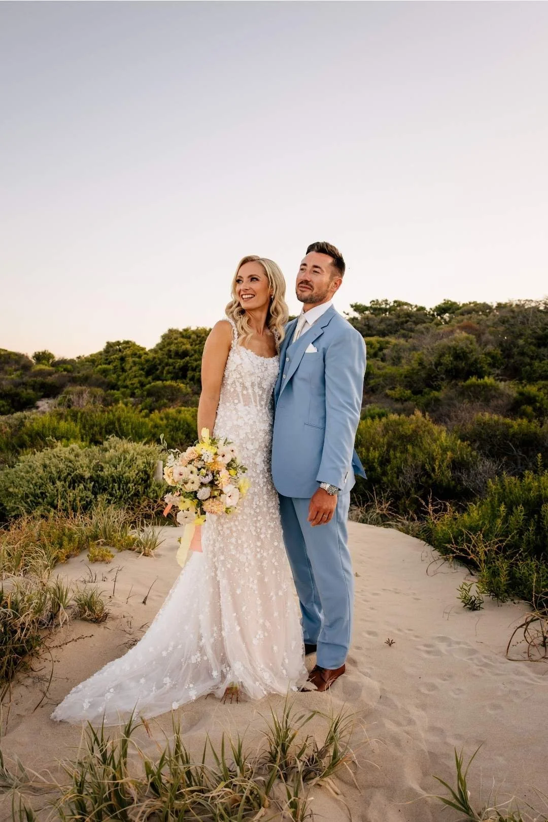 Bride and groom from a Stella Kelly wedding sharing their review