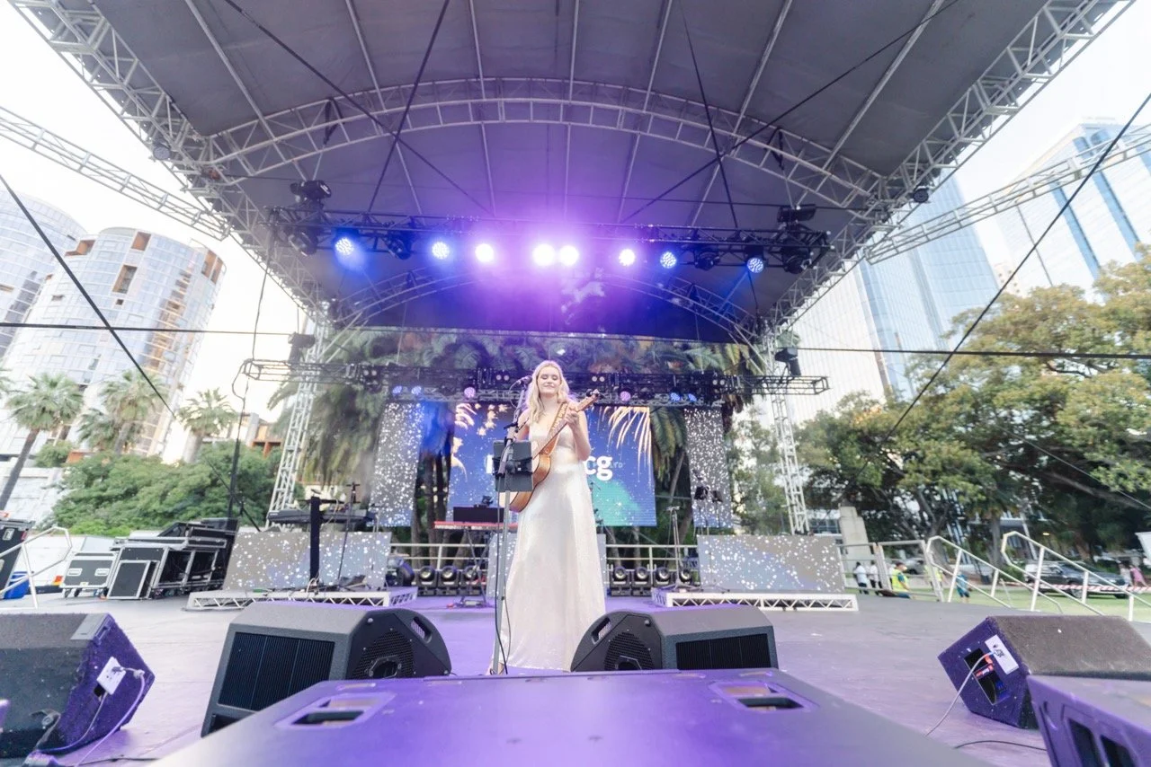 Stella Kelly singing at Perth City Carols 2023