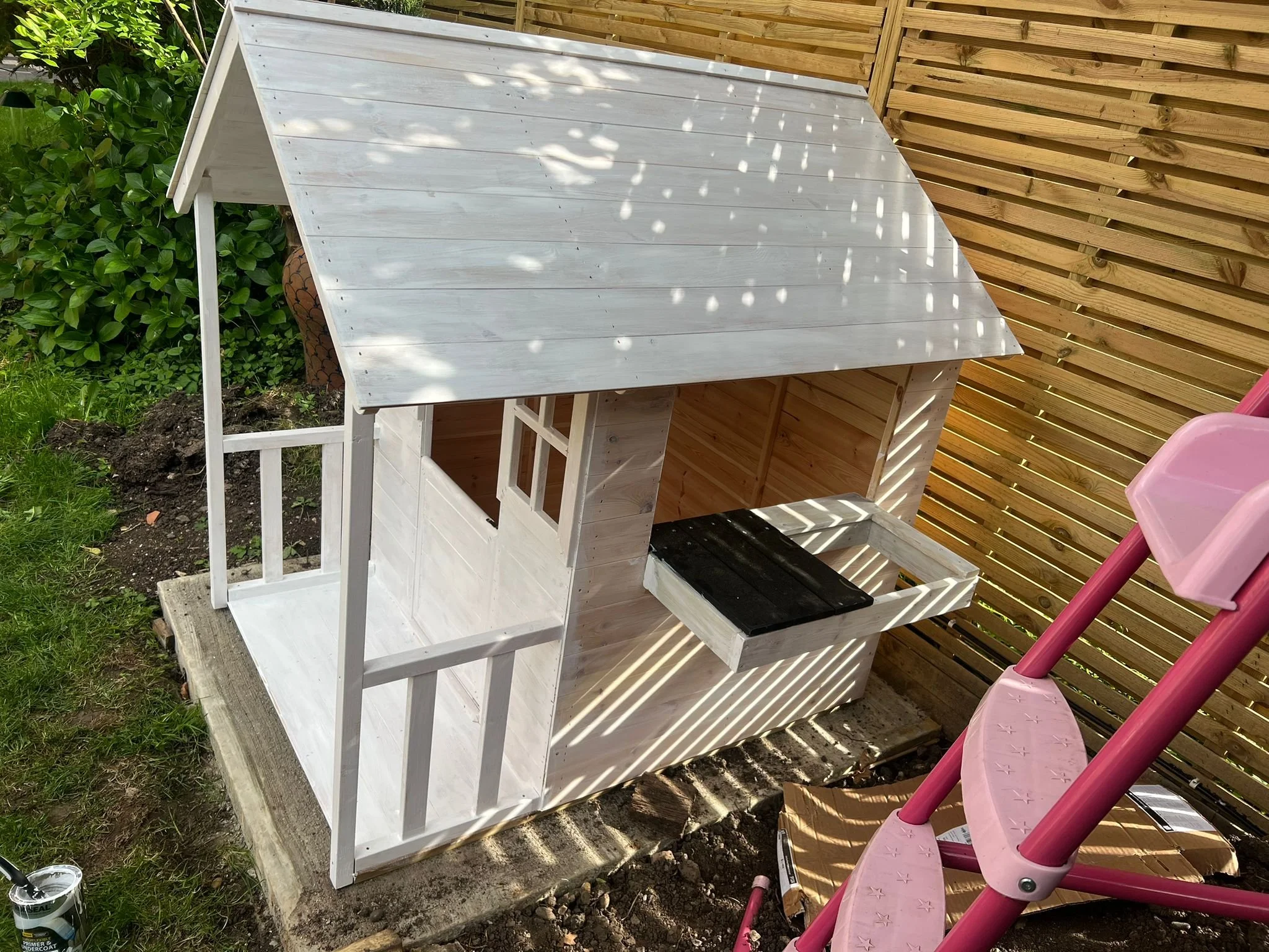 Assembly and painting of wooden playhouse  safe, fun, and professionally finished